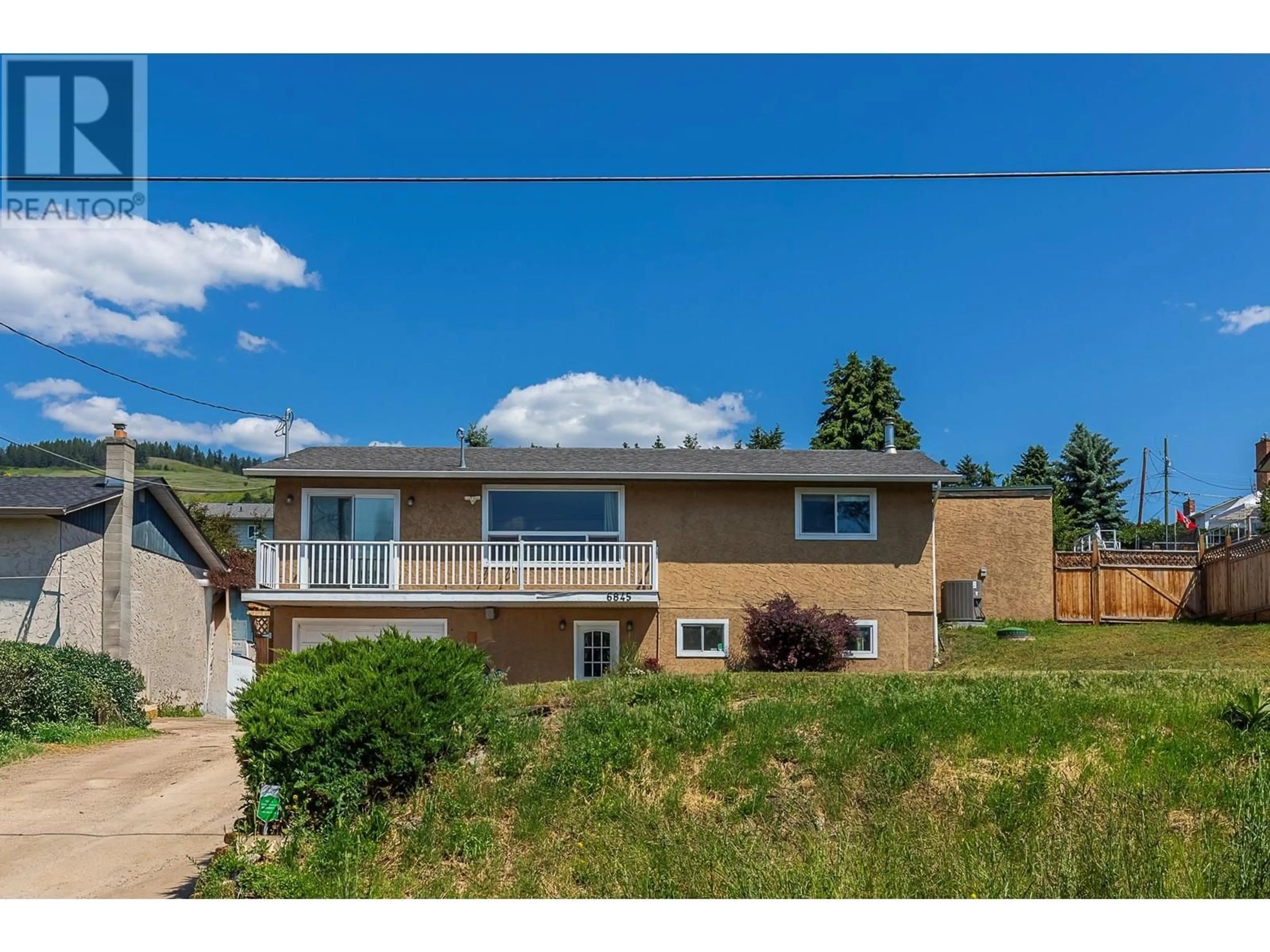 Home with vinyl exterior material, mountain view for 6845 HERRY ROAD, Vernon British Columbia V1B3T4