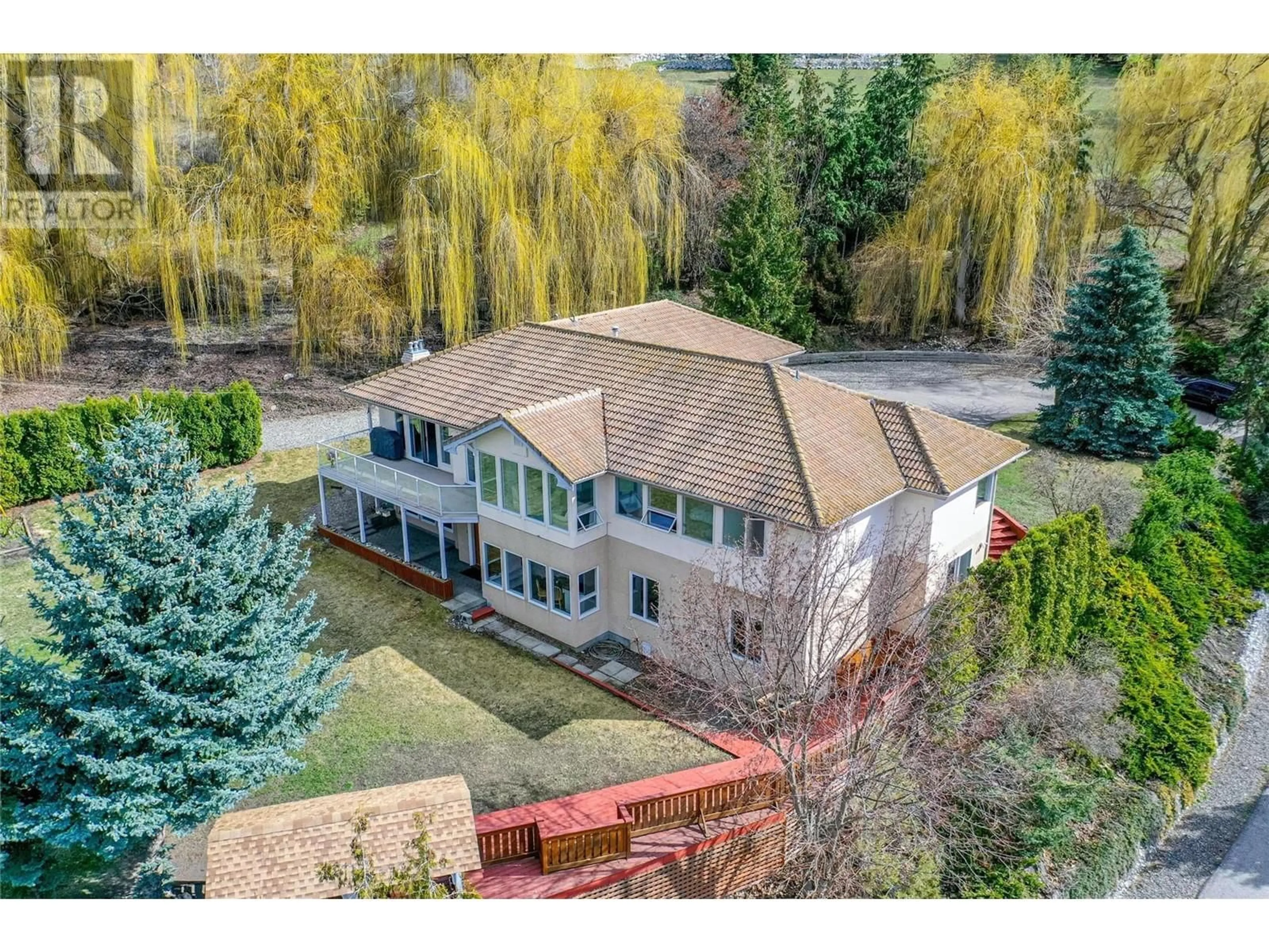 A pic from outside/outdoor area/front of a property/back of a property/a pic from drone, water/lake/river/ocean view for 363 NORTHWIND DRIVE, Vernon British Columbia V1H1X1