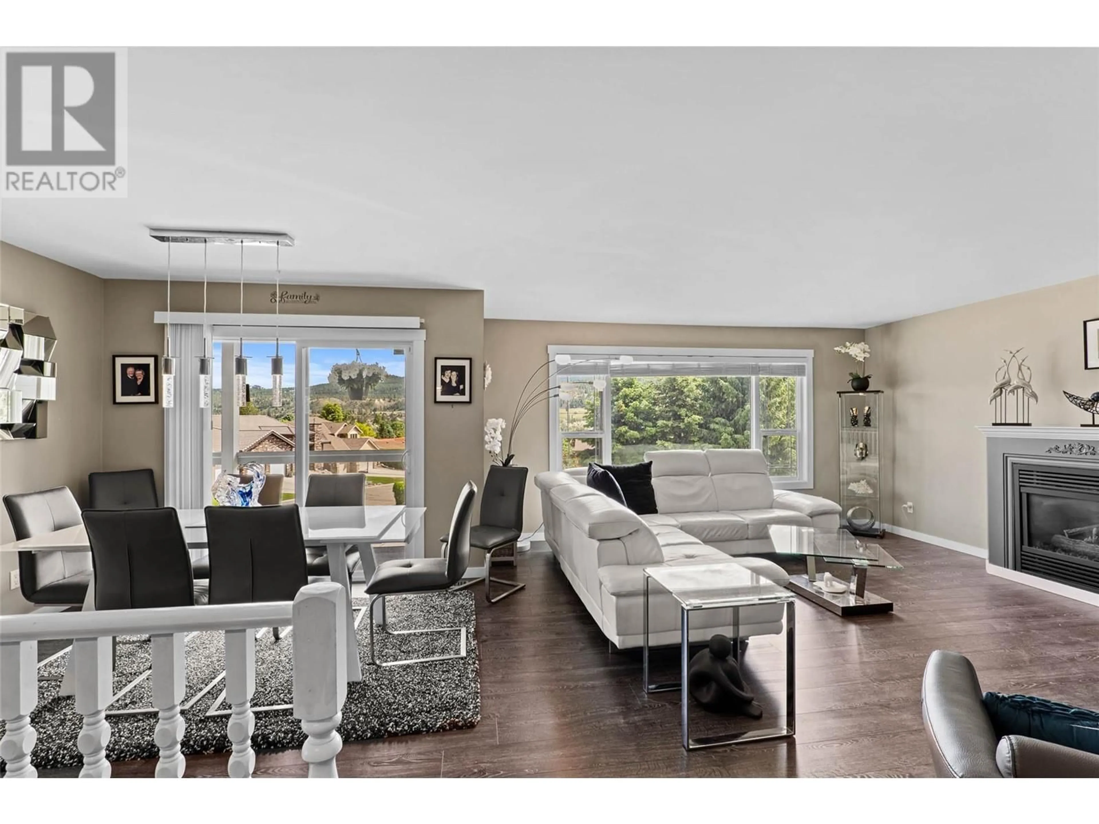 Living room with furniture, wood/laminate floor for 3445 NAVATANEE DRIVE, Kamloops British Columbia V2H1S1