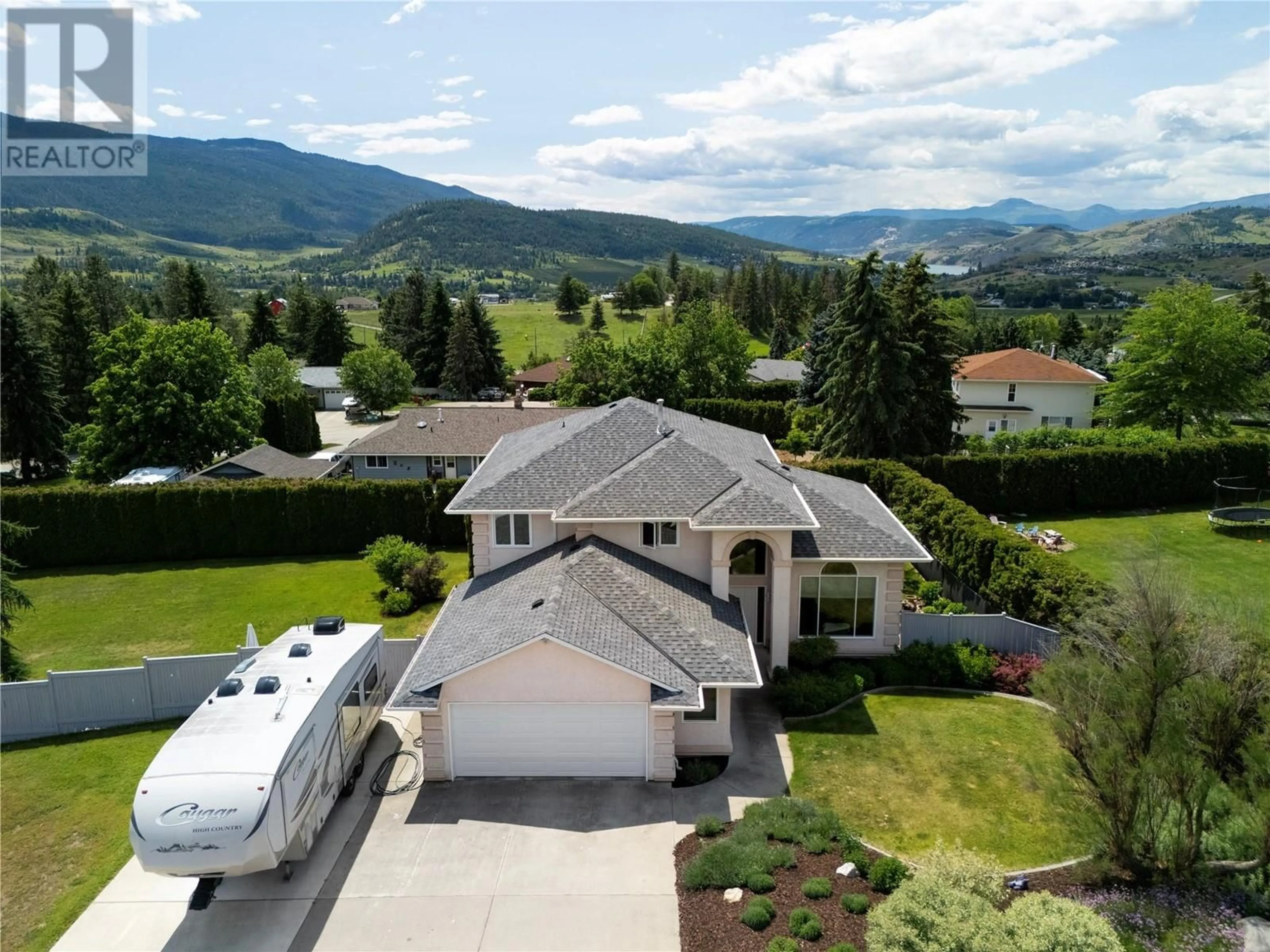 A pic from outside/outdoor area/front of a property/back of a property/a pic from drone, mountain view for 444 ROCKLAND DRIVE, Coldstream British Columbia V1B2X5