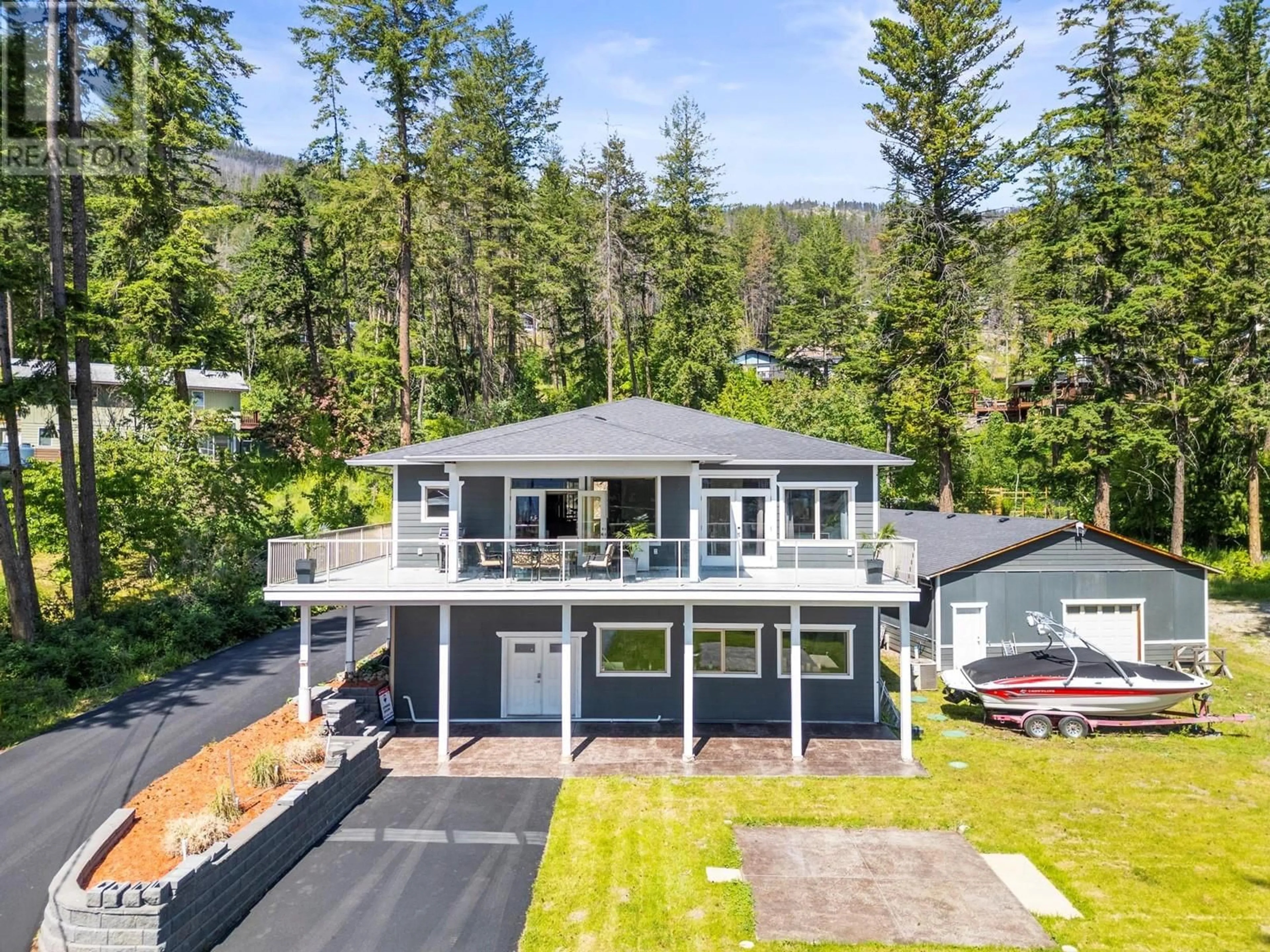 A pic from outside/outdoor area/front of a property/back of a property/a pic from drone, mountain view for 70 LESTER ROAD, Vernon British Columbia V1H2G3