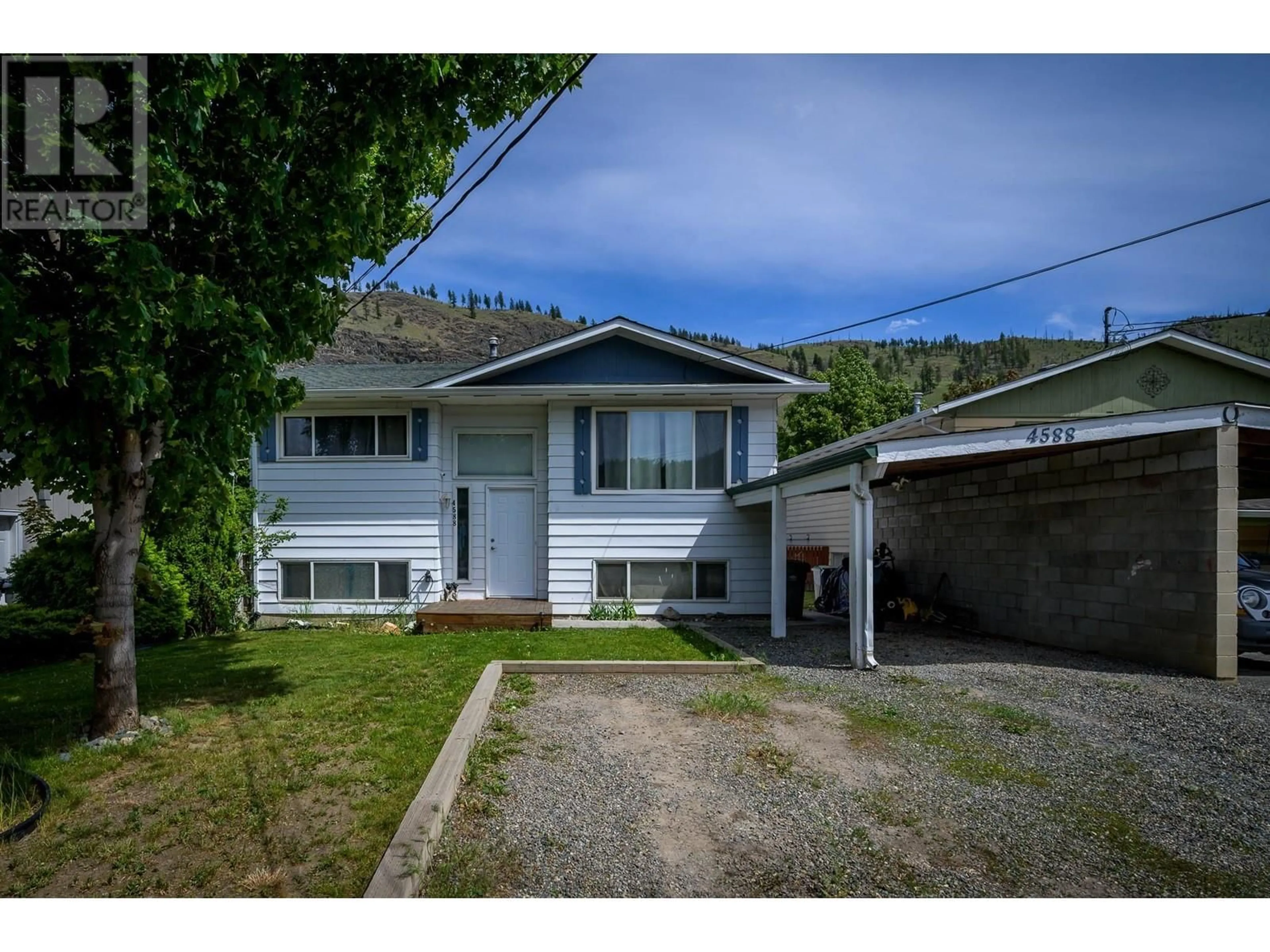 A pic from outside/outdoor area/front of a property/back of a property/a pic from drone, street for 4588 CAMMERAY DRIVE, Kamloops British Columbia V2H1L4