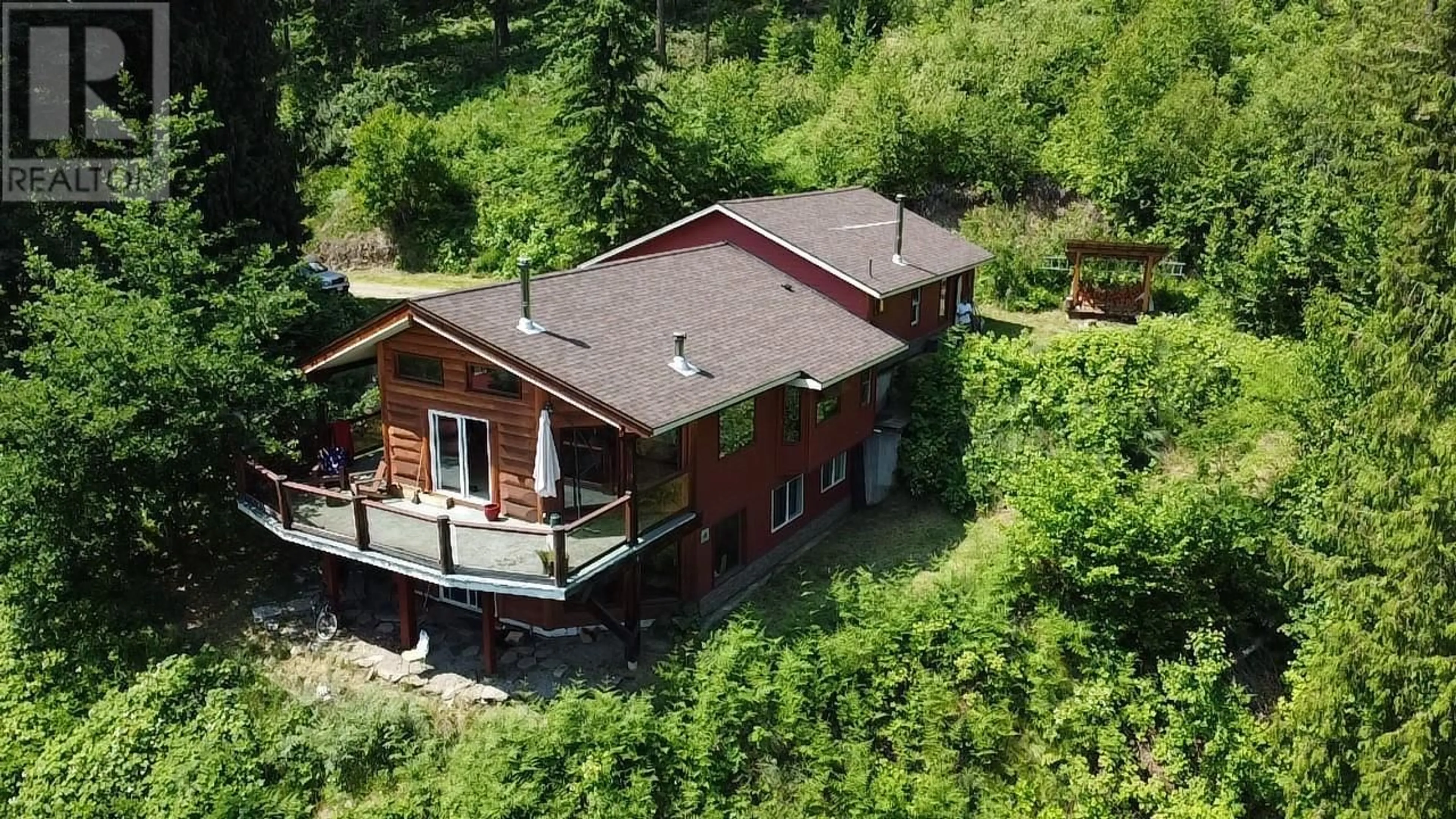 A pic from outside/outdoor area/front of a property/back of a property/a pic from drone, building for 242 9TH STREET, Kaslo British Columbia V0G1M0