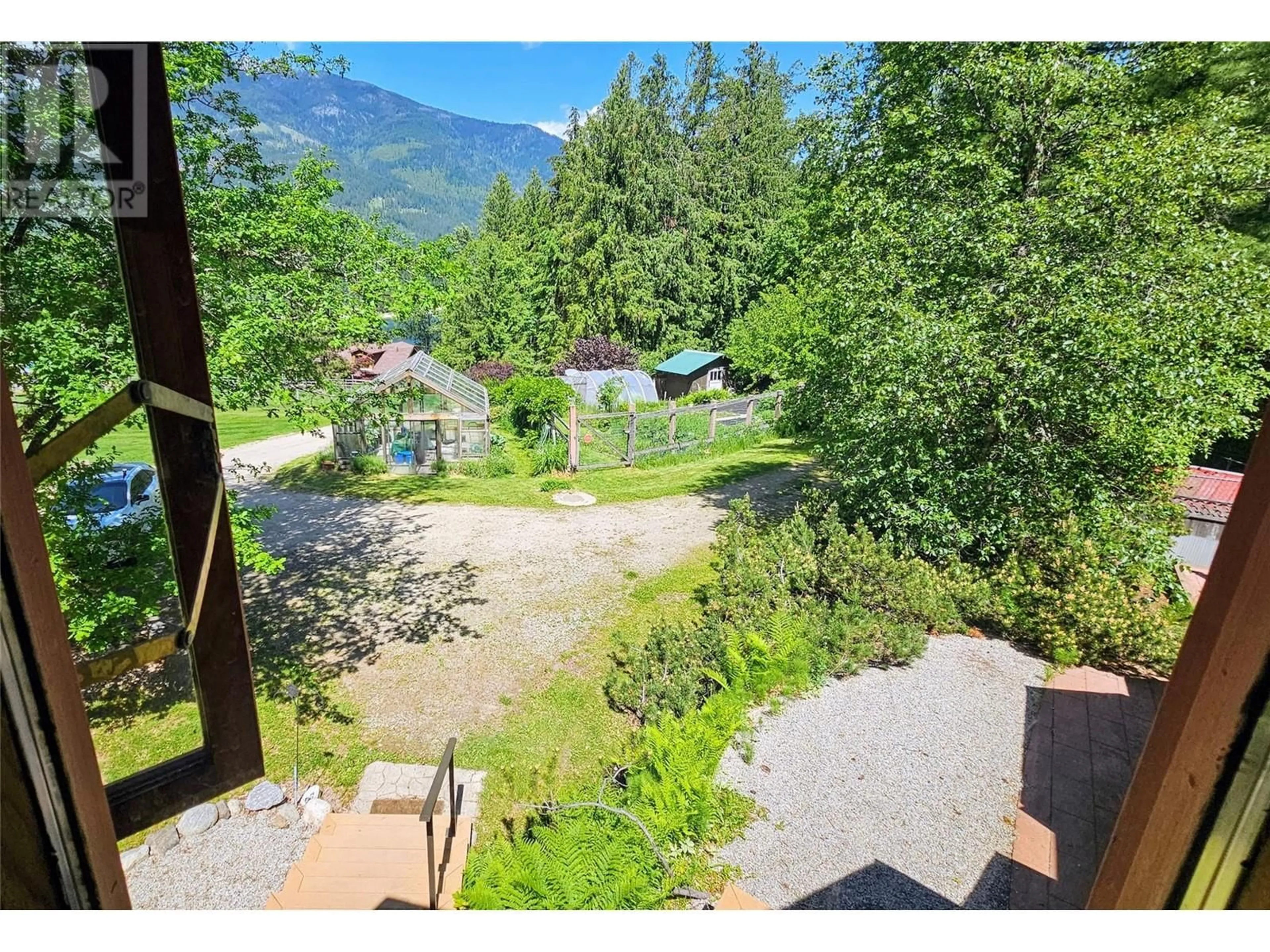 A pic from outside/outdoor area/front of a property/back of a property/a pic from drone, mountain view for 8496 B PROCTER EAST ROAD, Procter British Columbia V1L0B7