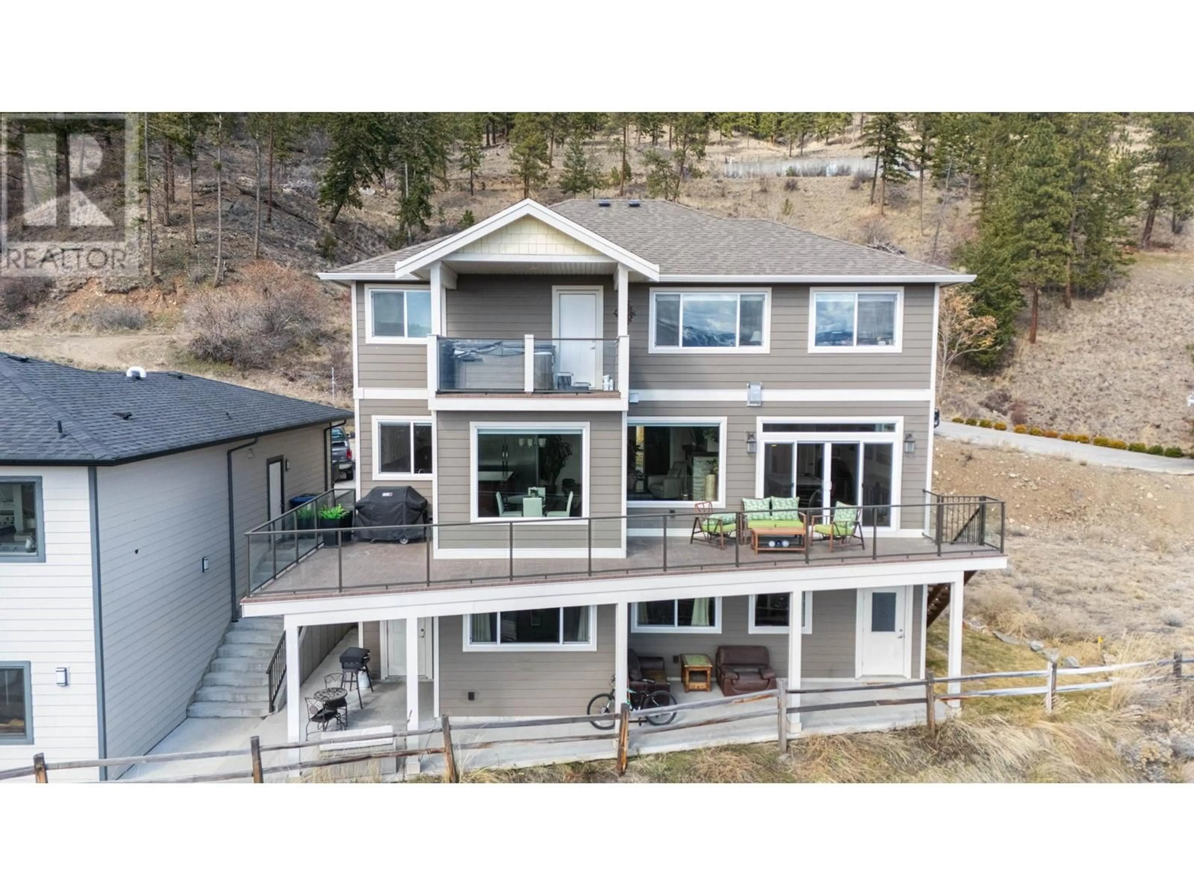 A pic from outside/outdoor area/front of a property/back of a property/a pic from drone, water/lake/river/ocean view for 2373 BIG SKY DRIVE, West Kelowna British Columbia V4T3K4