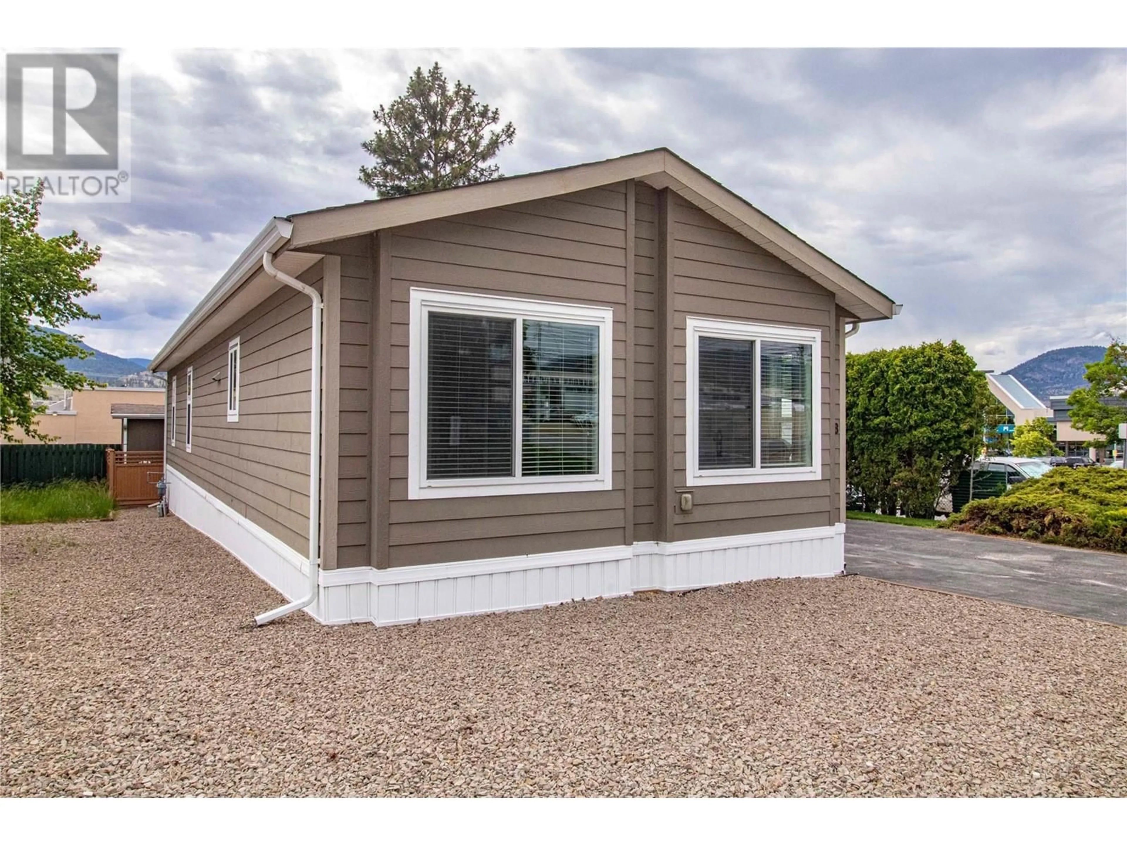 Home with vinyl exterior material, street for 28 - 98 OKANAGAN AVENUE EAST, Penticton British Columbia V2A3J5