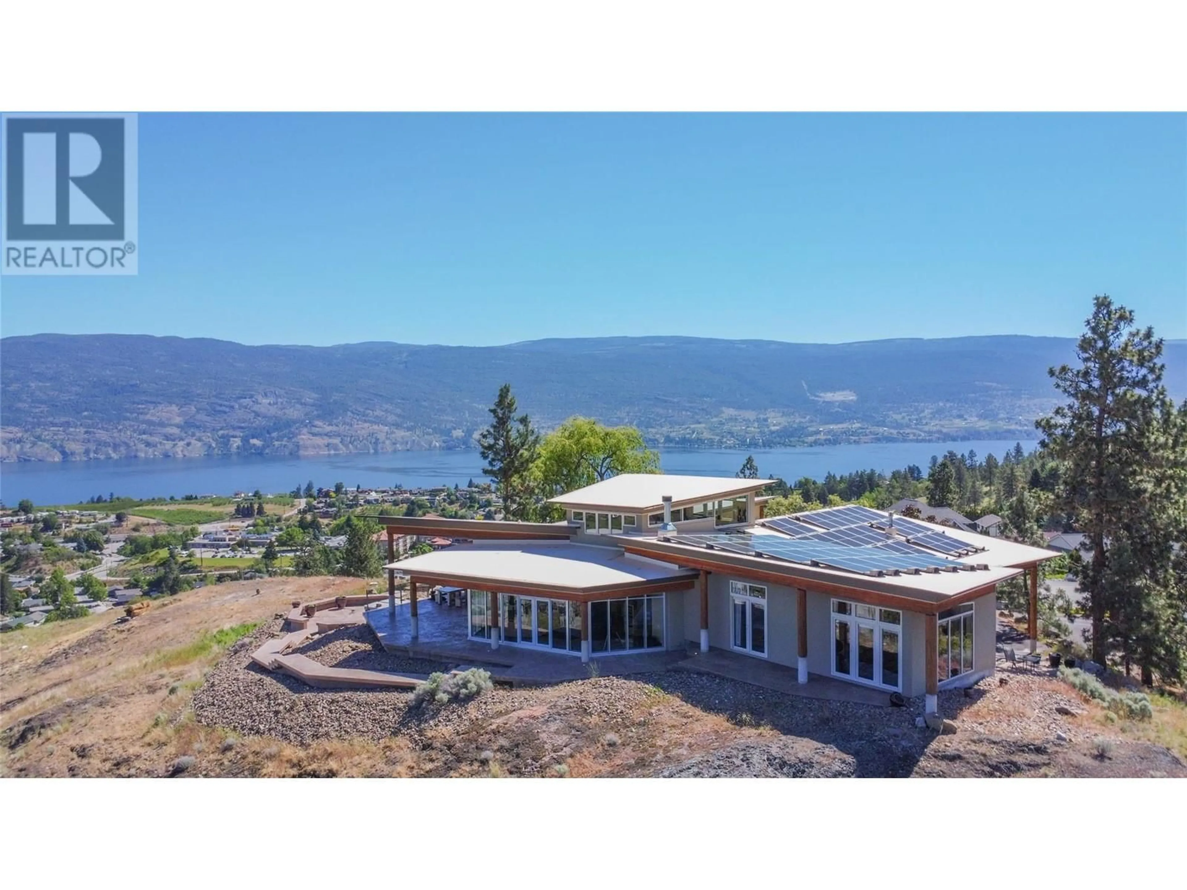 A pic from outside/outdoor area/front of a property/back of a property/a pic from drone, water/lake/river/ocean view for 12015 TRAYLER PLACE, Summerland British Columbia V0H1Z7