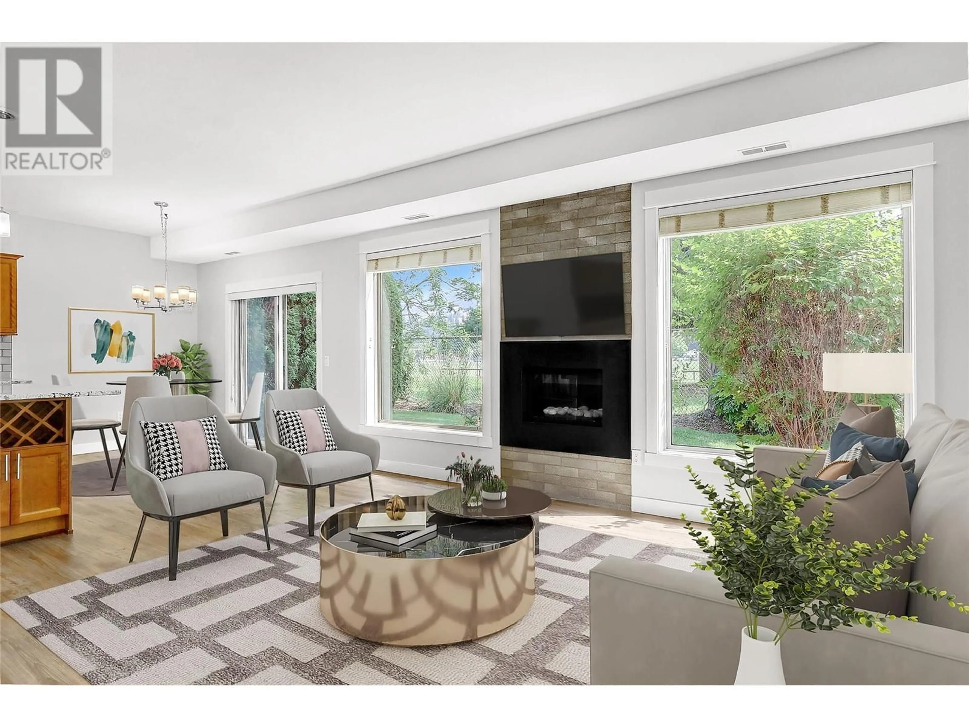Living room with furniture, ceramic/tile floor for 503 - 3350 WOODSDALE ROAD, Lake Country British Columbia V4V2R7