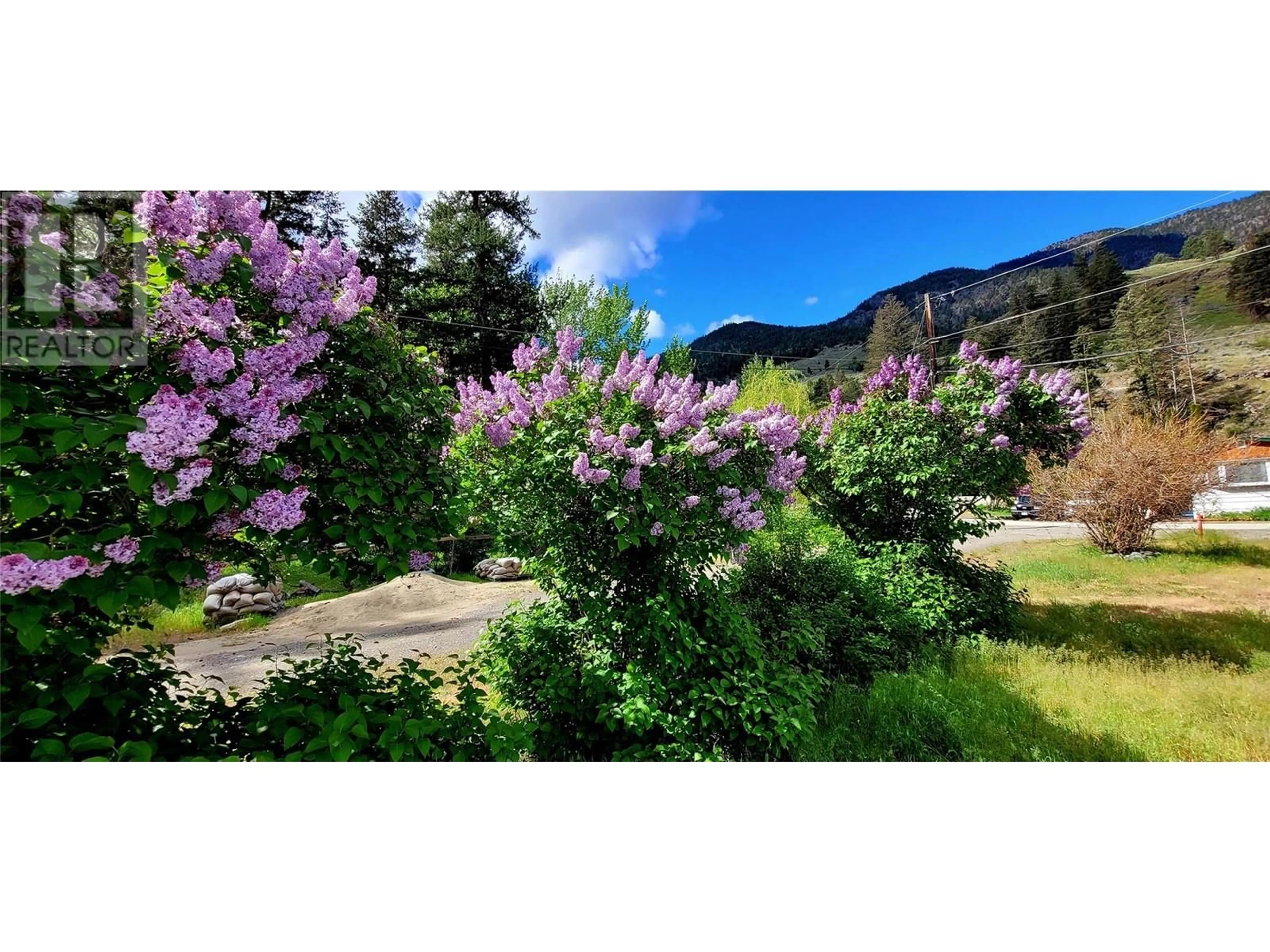 A pic from outside/outdoor area/front of a property/back of a property/a pic from drone, mountain view for 15 - 1514 HWY 3A HIGHWAY, Olalla British Columbia V0X1N6