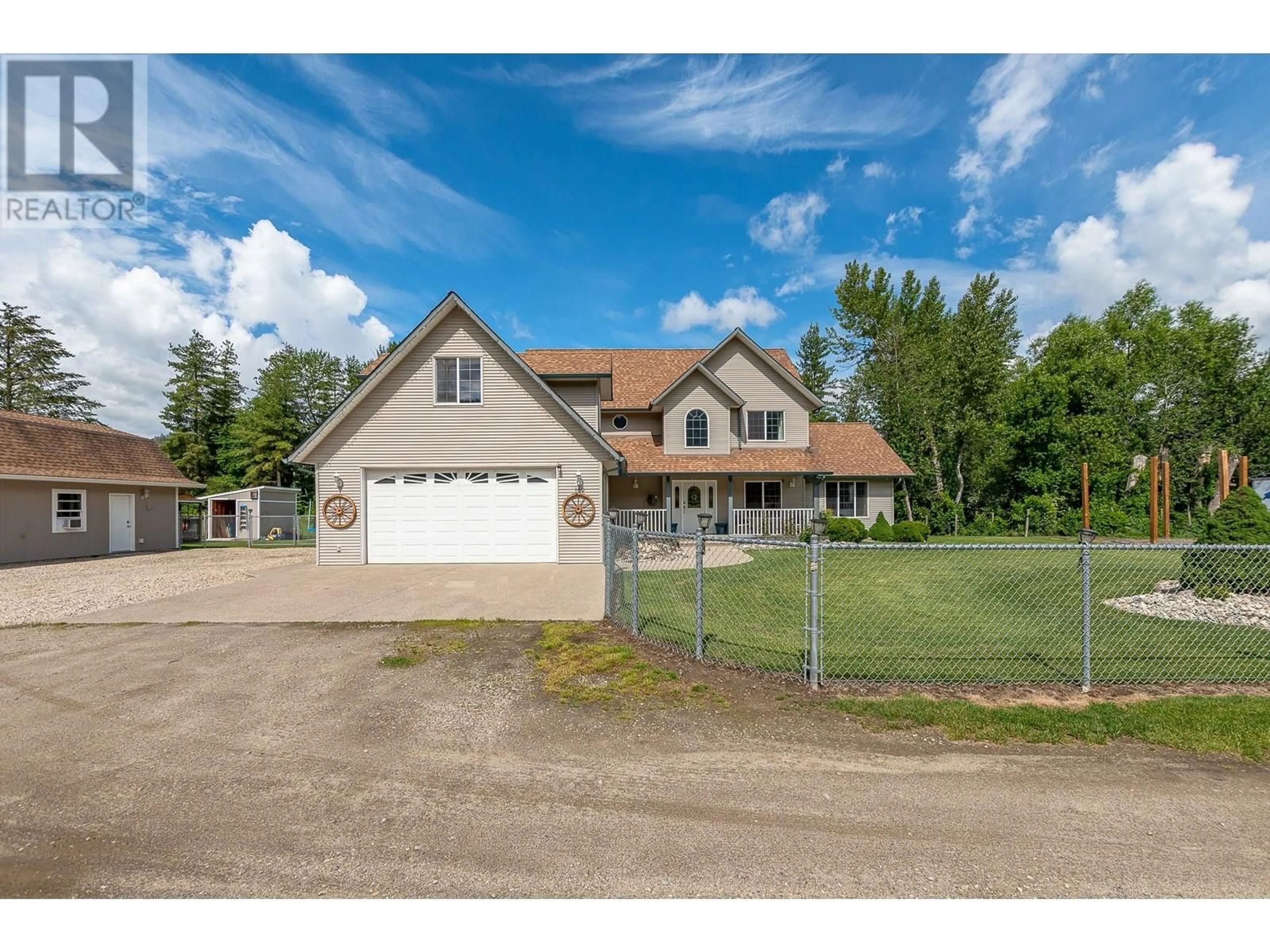 A pic from outside/outdoor area/front of a property/back of a property/a pic from drone, unknown for 160 CARLIN STREET, Grindrod British Columbia V0E1Y0