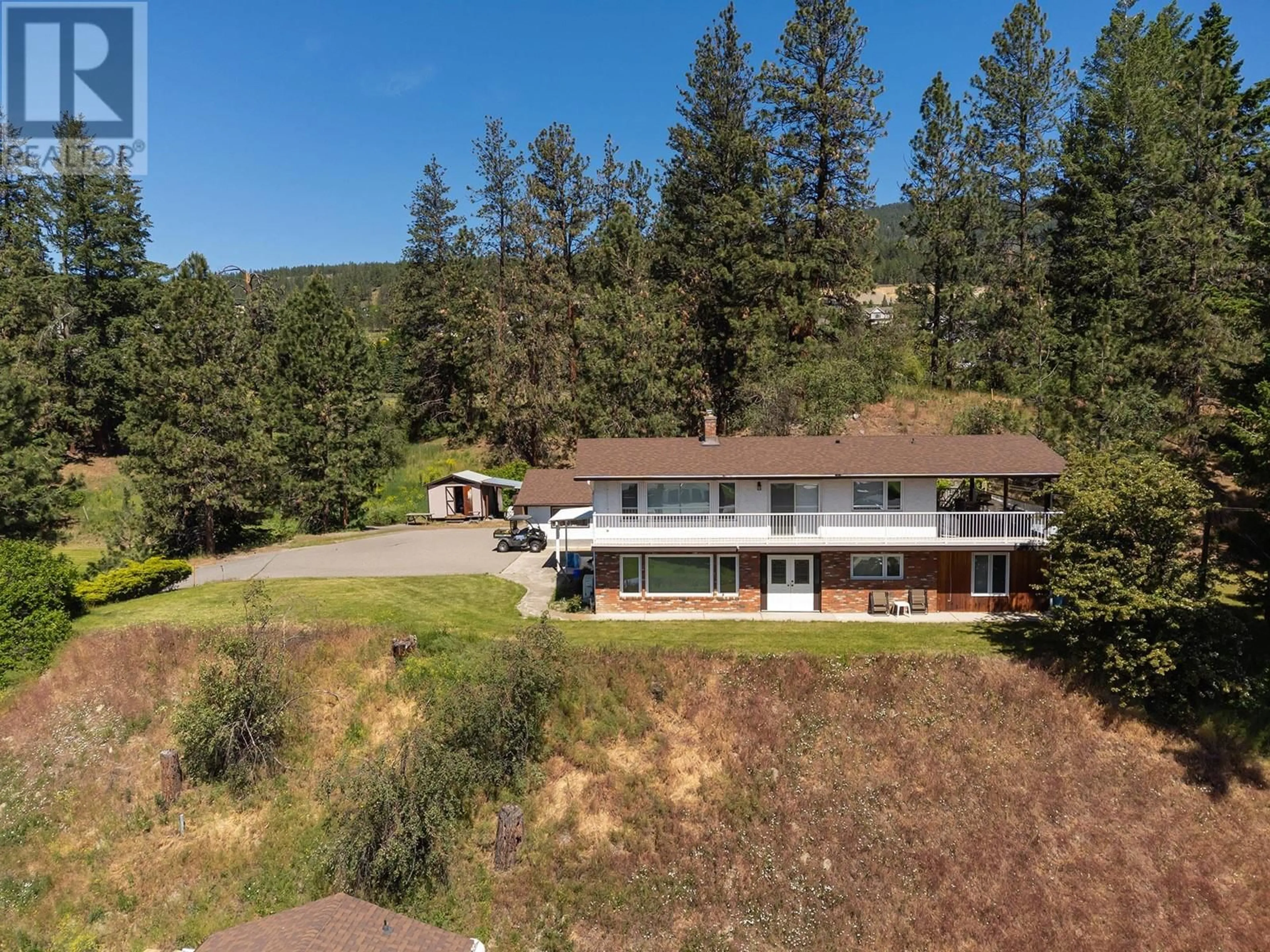 A pic from outside/outdoor area/front of a property/back of a property/a pic from drone, unknown for 3101 ELLIOTT ROAD, West Kelowna British Columbia V4T1M2