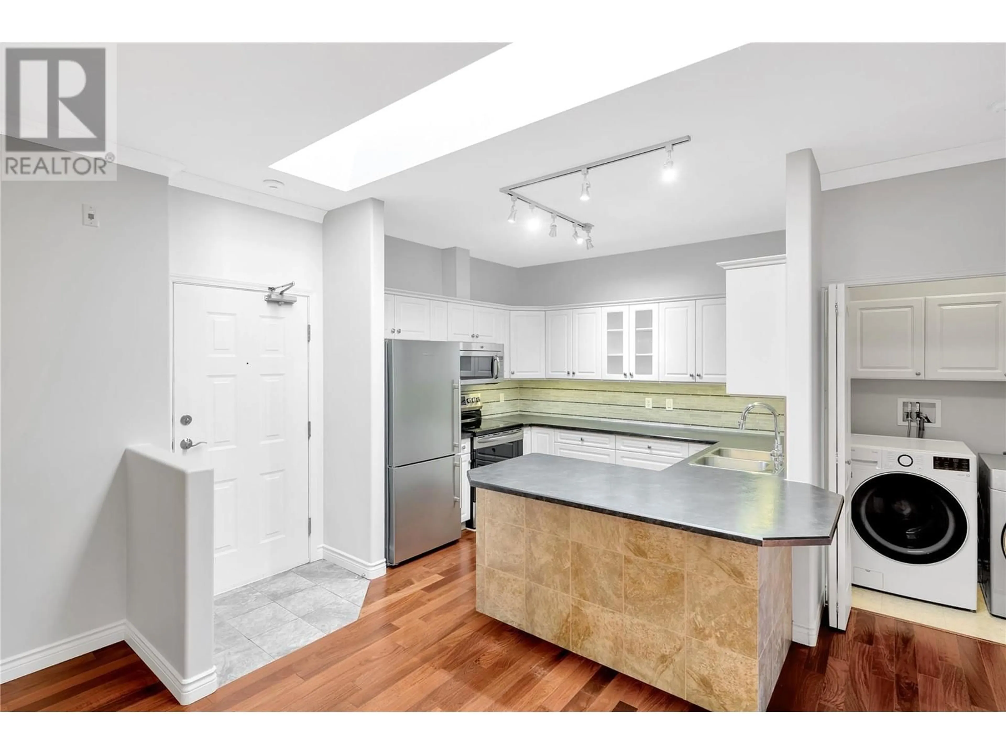 Open concept kitchen, unknown for 313 - 2300 BENVOULIN ROAD, Kelowna British Columbia V1W2C6
