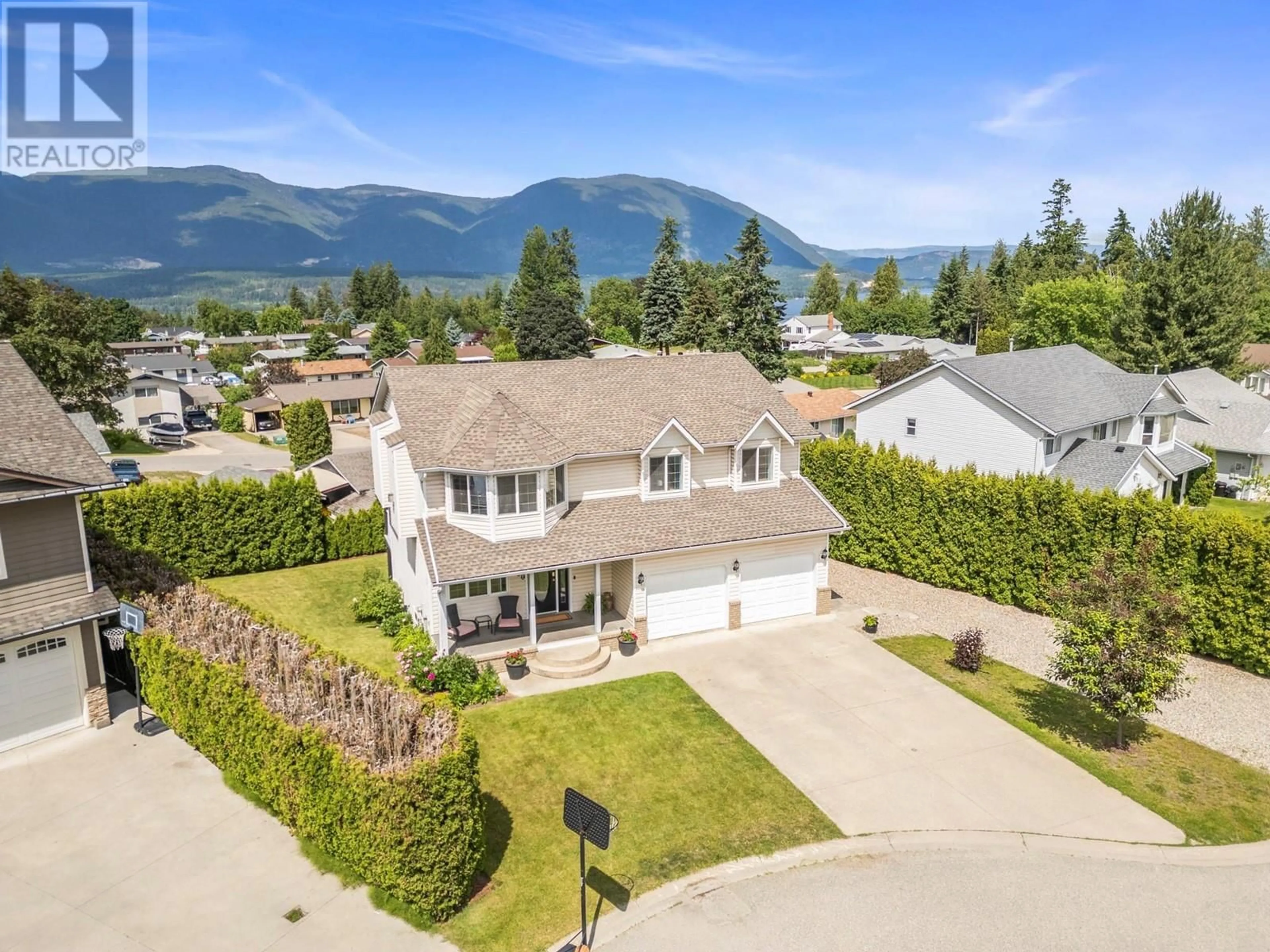 A pic from outside/outdoor area/front of a property/back of a property/a pic from drone, mountain view for 1960 2 AVENUE NORTHEAST, Salmon Arm British Columbia V1E1M3