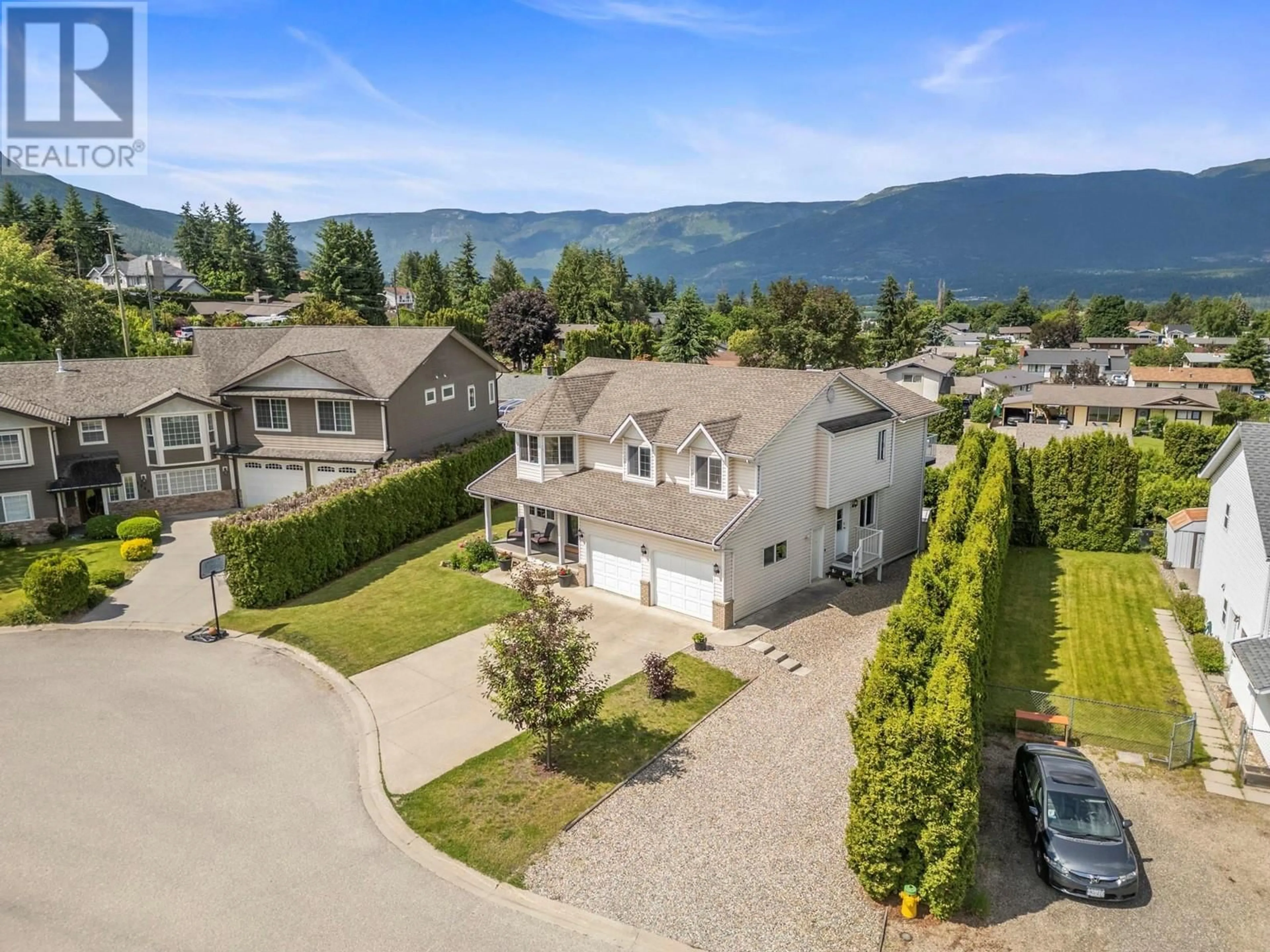 A pic from outside/outdoor area/front of a property/back of a property/a pic from drone, mountain view for 1960 2 AVENUE NORTHEAST, Salmon Arm British Columbia V1E1M3