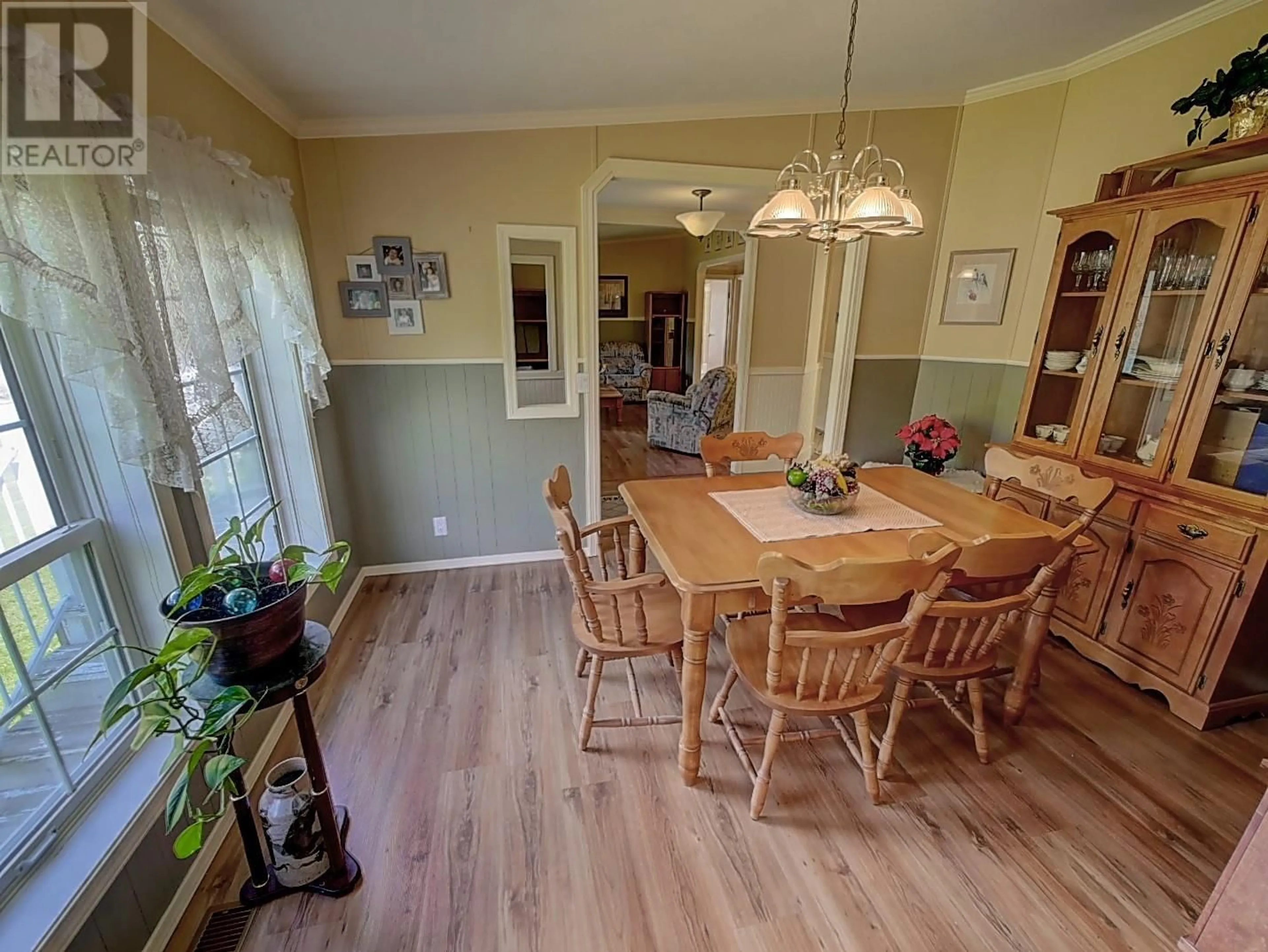 Dining room, wood/laminate floor for 82 FRANSON ROAD, Christina Lake British Columbia V0H1E2