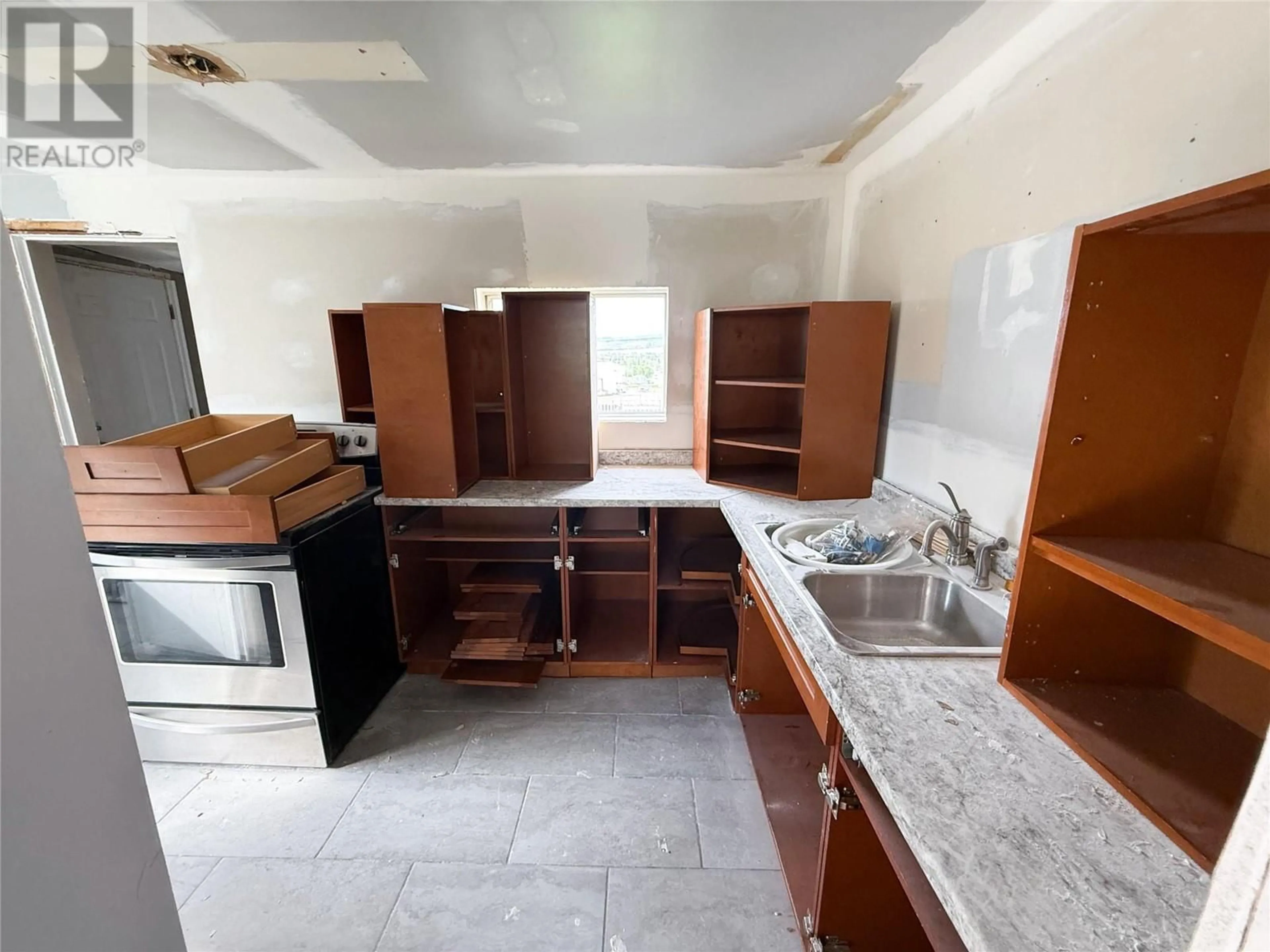 Standard kitchen, unknown for 1541 96 AVENUE, Dawson Creek British Columbia V1G1L2