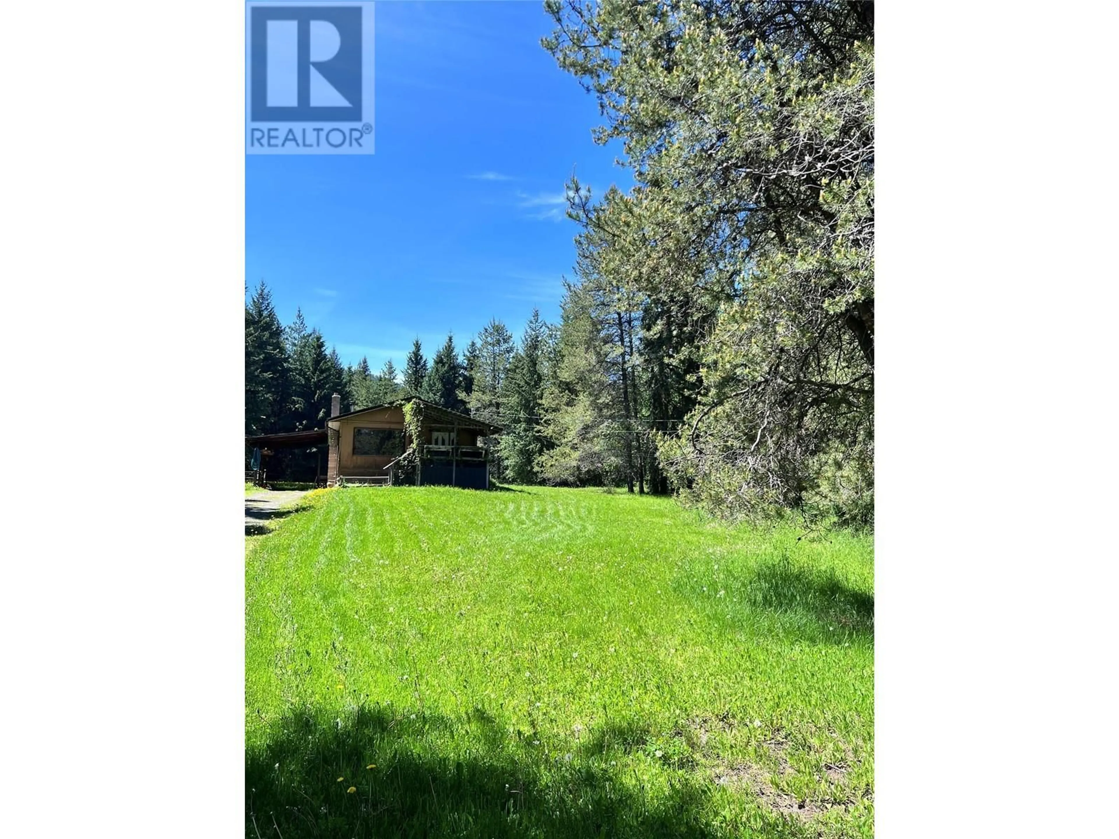 A pic from outside/outdoor area/front of a property/back of a property/a pic from drone, forest/trees view for 44 HOLLINGSWORTH ROAD, Cherryville British Columbia V0E2G3
