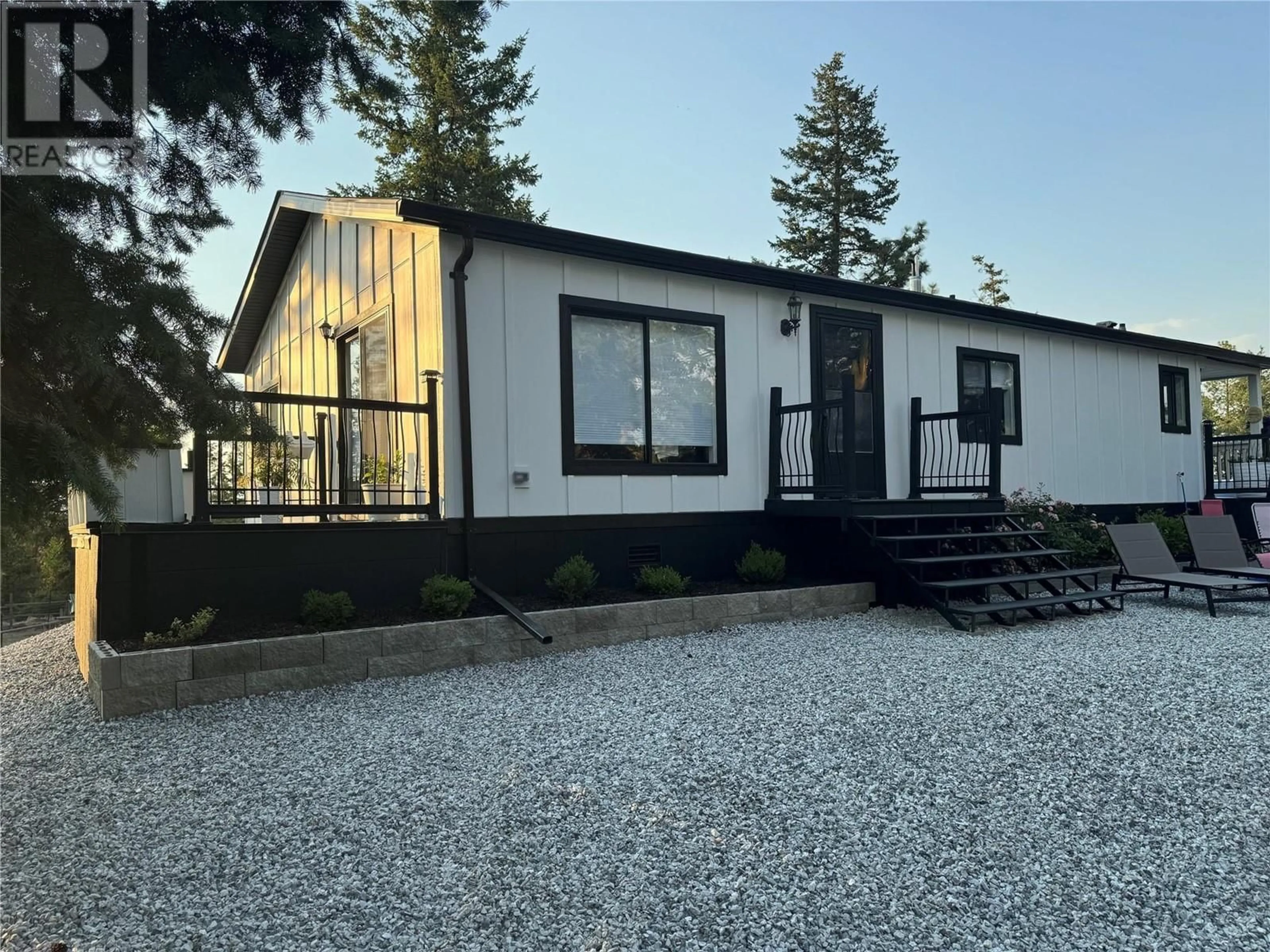 Home with vinyl exterior material, street for 338 HOWARDS ROAD, Vernon British Columbia V1T6Y5