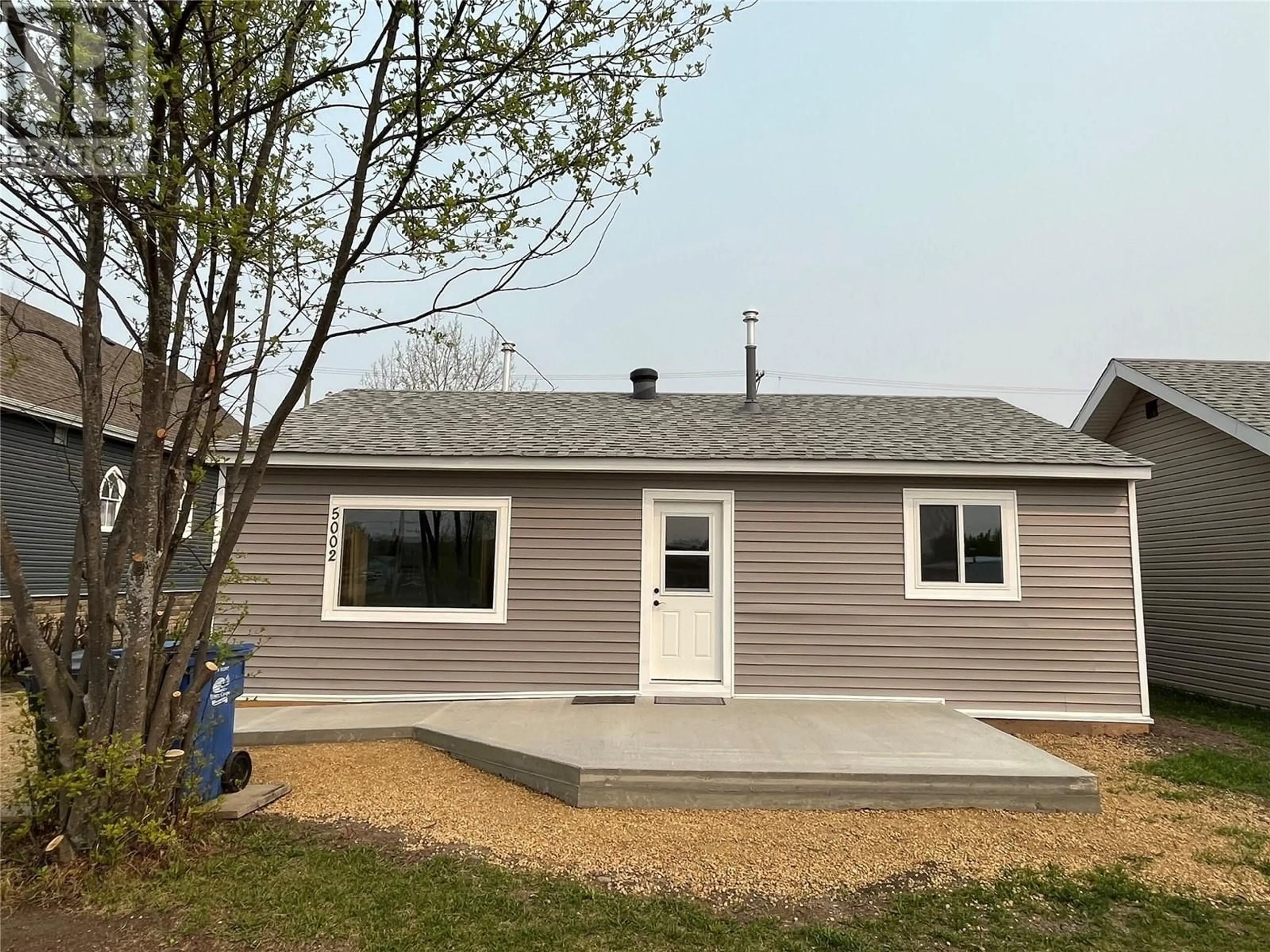 Home with vinyl exterior material, building for 5002 48 AVENUE, Pouce Coupe British Columbia V0C2C0