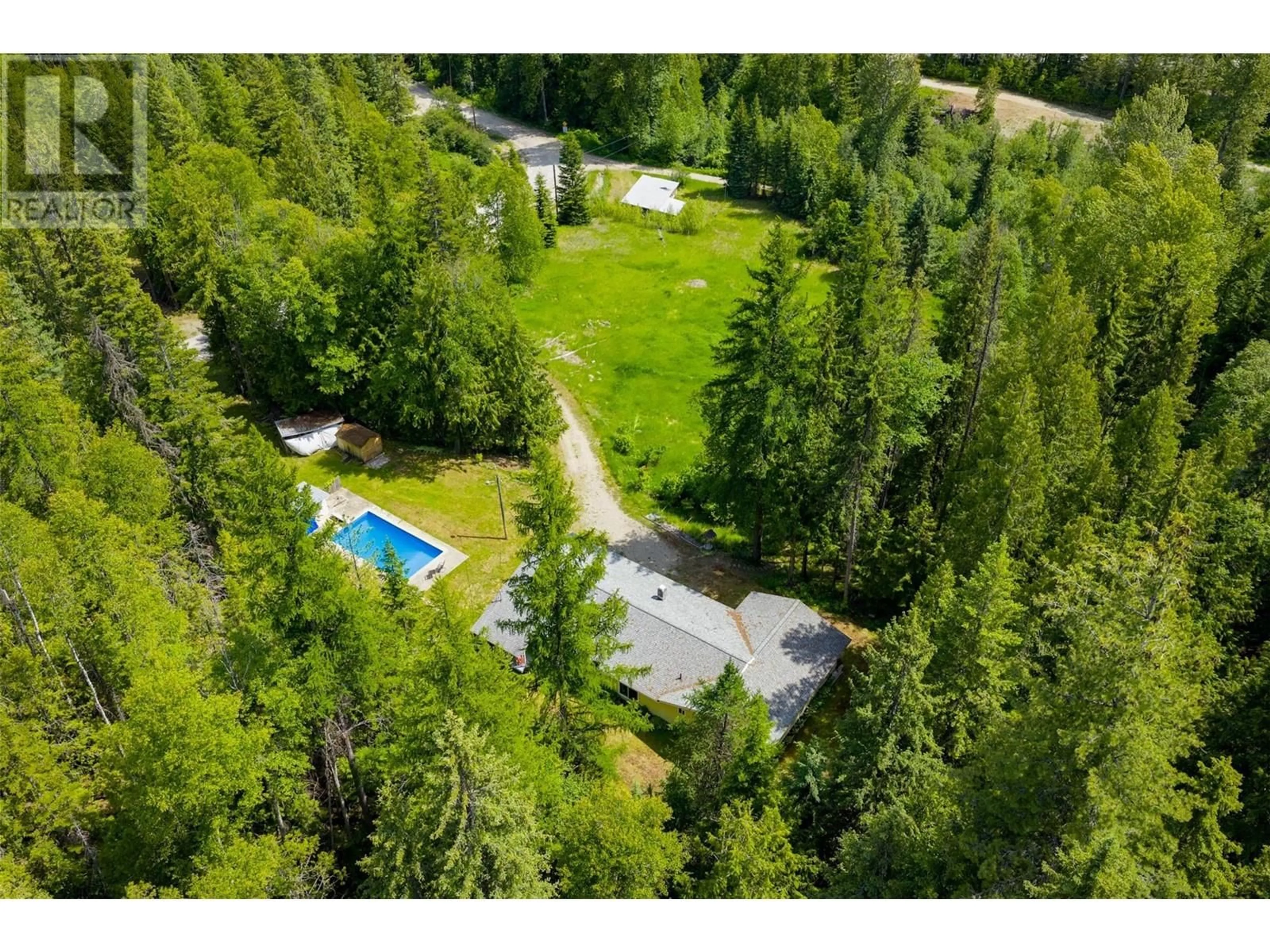 A pic from outside/outdoor area/front of a property/back of a property/a pic from drone, forest/trees view for 125 BEAVERVALE ROAD, Ross Spur British Columbia V0G1L1