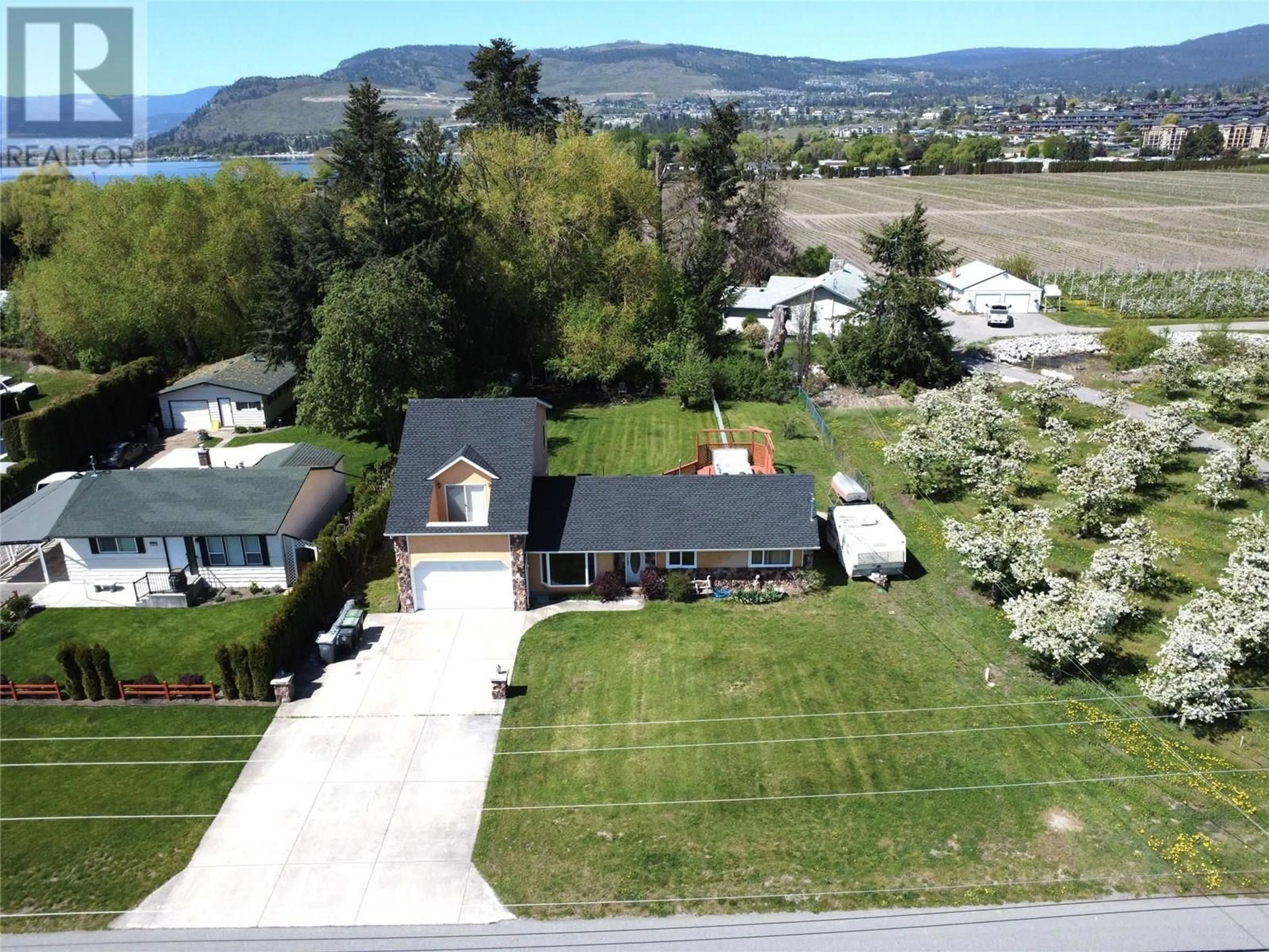 A pic from outside/outdoor area/front of a property/back of a property/a pic from drone, water/lake/river/ocean view for 3982 HITCHNER ROAD, West Kelowna British Columbia V4T2C9