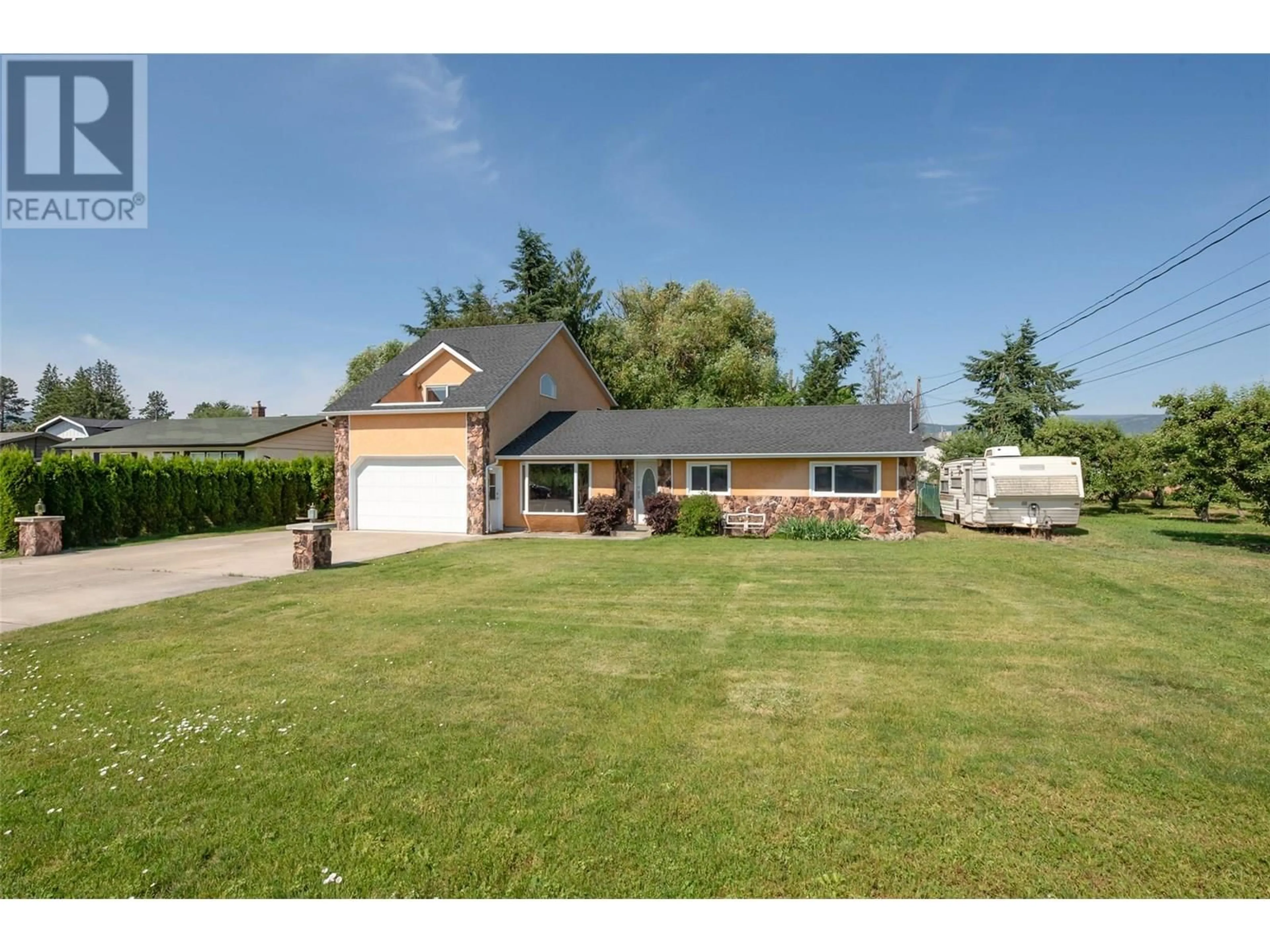 A pic from outside/outdoor area/front of a property/back of a property/a pic from drone, street for 3982 HITCHNER ROAD, West Kelowna British Columbia V4T2C9