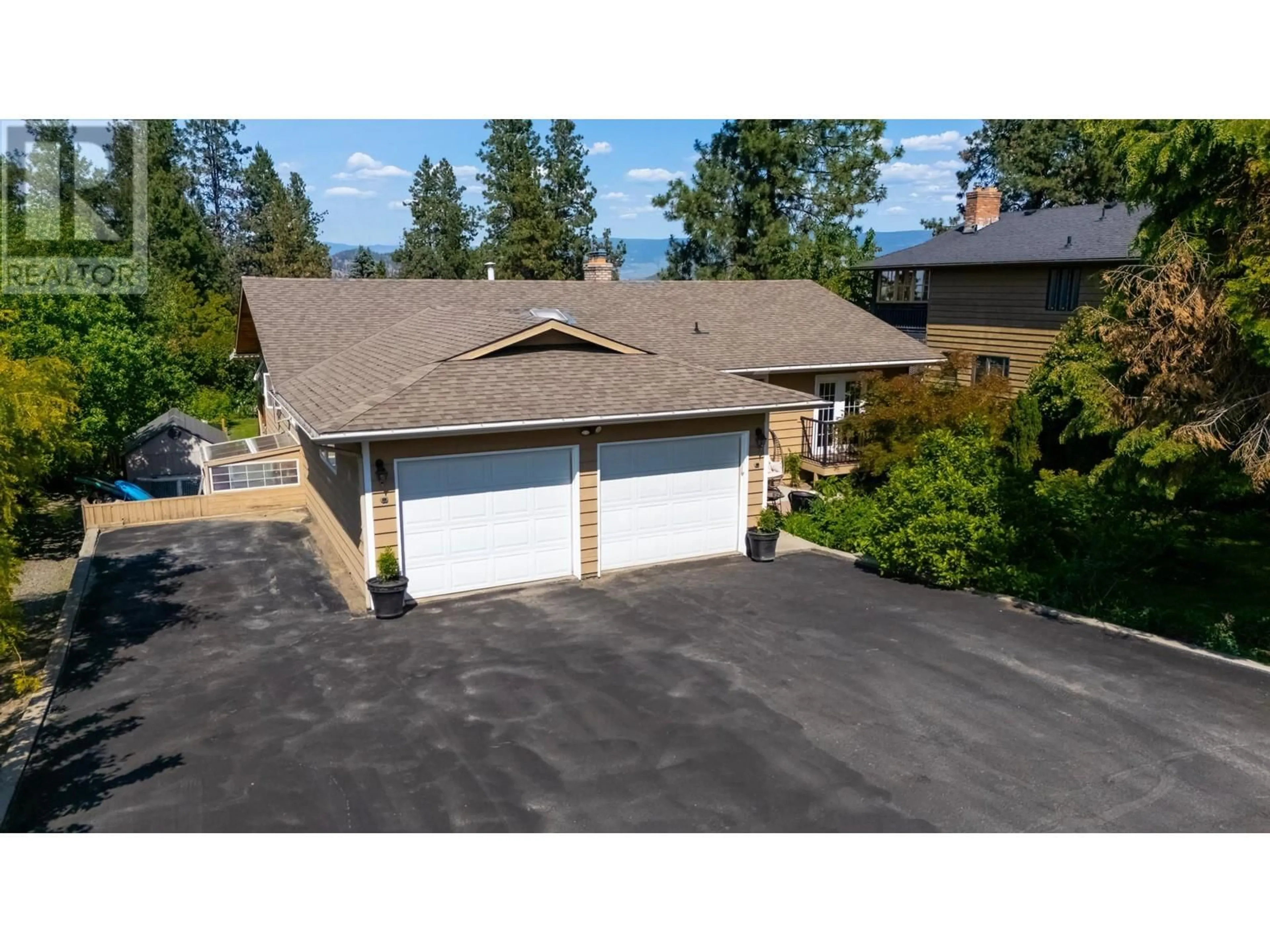 A pic from outside/outdoor area/front of a property/back of a property/a pic from drone, street for 2023 DERRICKSON PLACE, West Kelowna British Columbia V1Z2W3