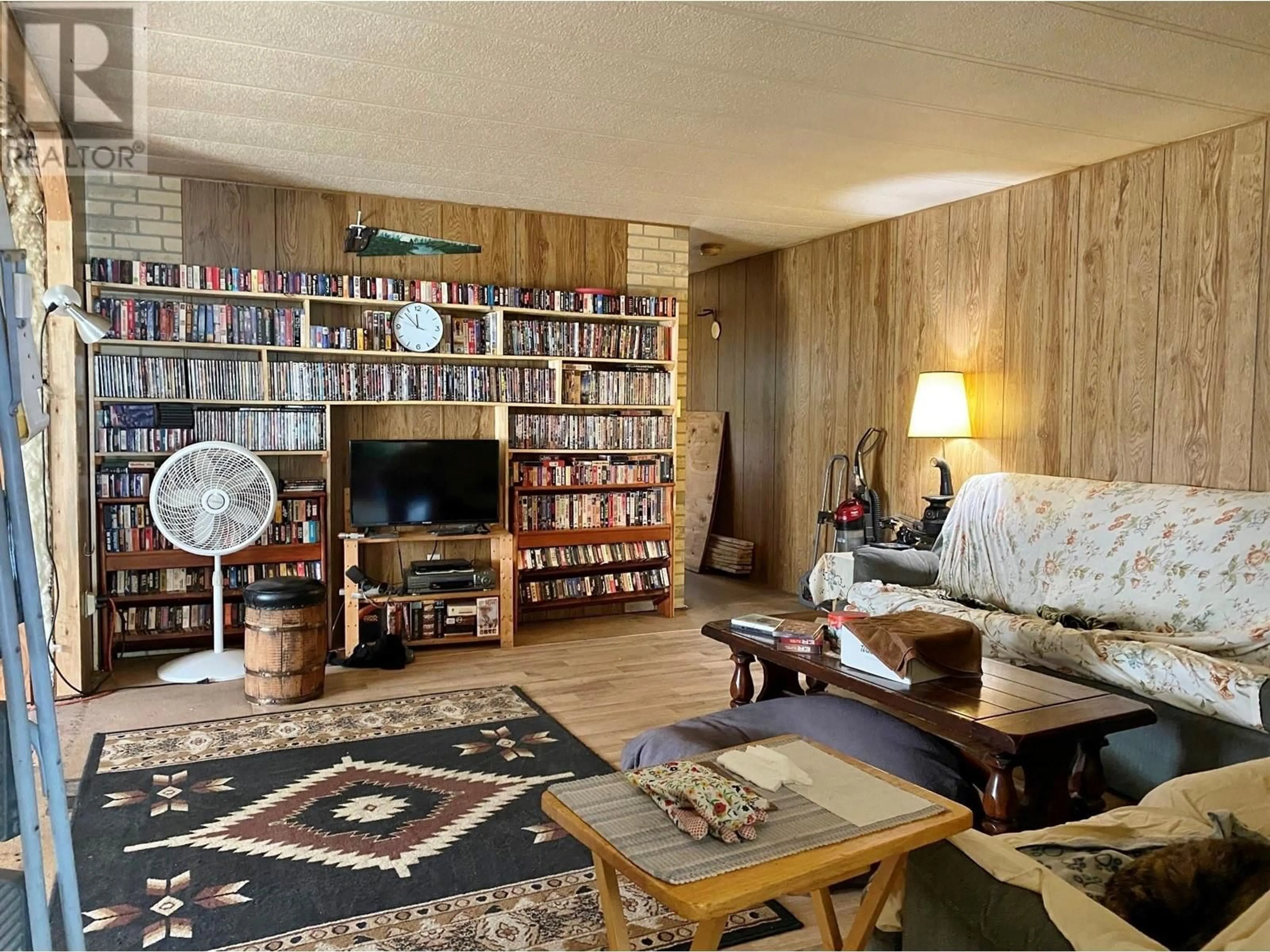 Living room with furniture, wood/laminate floor for 19300 NORTH FORK ROAD, Grand Forks British Columbia V0H1H1
