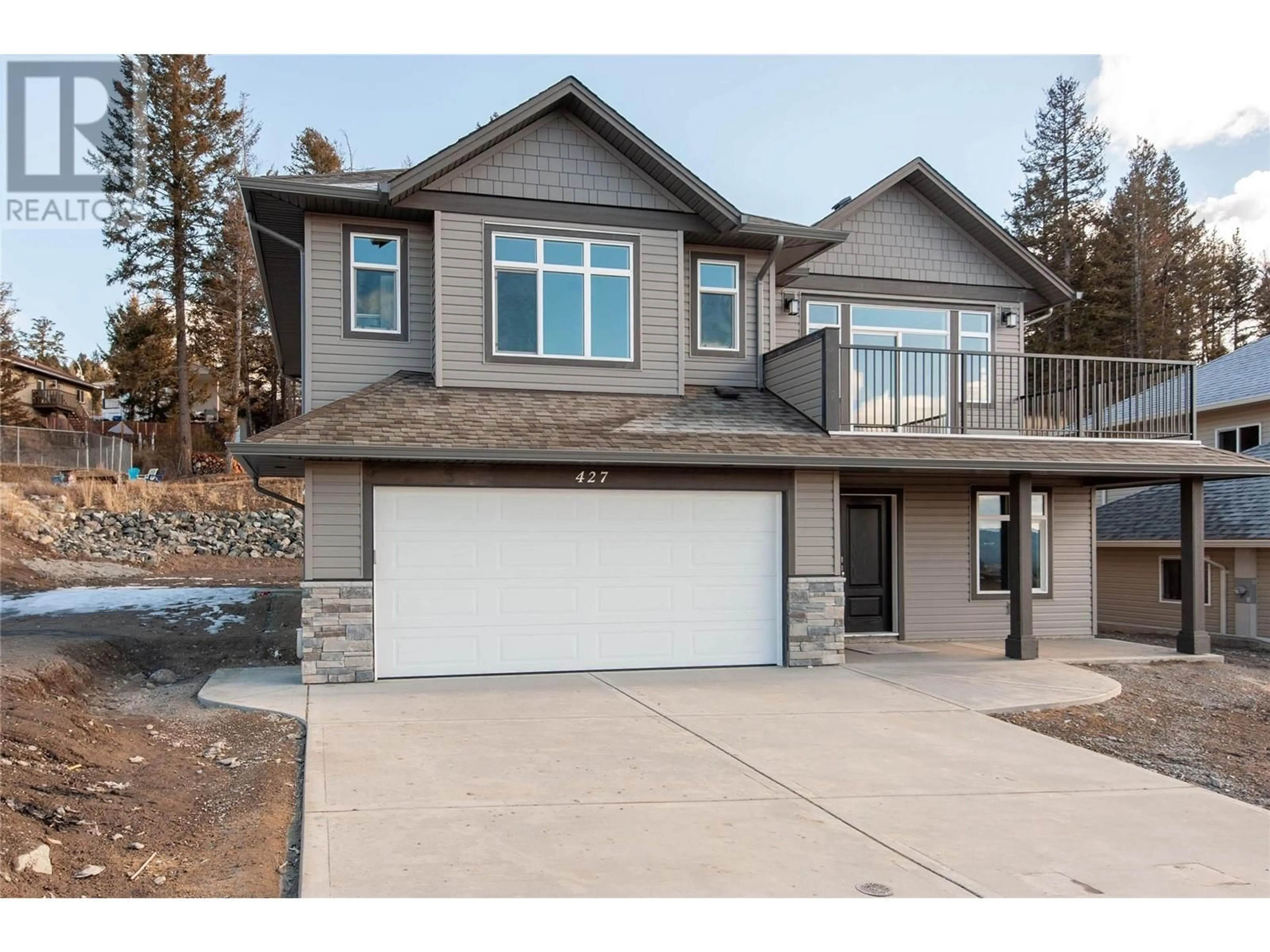 Home with vinyl exterior material, street for 427 POPLAR DRIVE, Logan Lake British Columbia V0K1W0