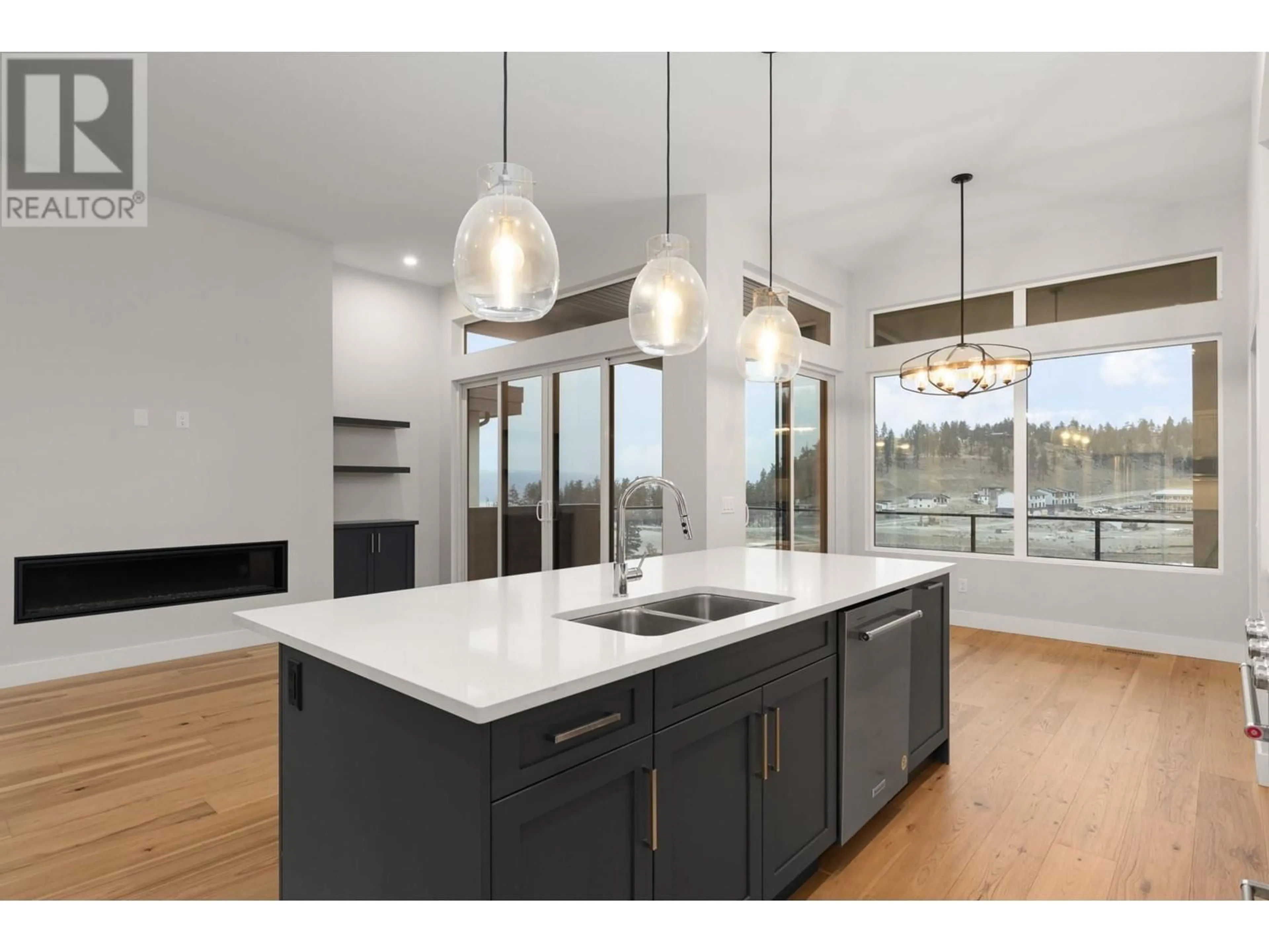 Open concept kitchen, unknown for 1928 NORTHERN FLICKER COURT, Kelowna British Columbia V1V0G3