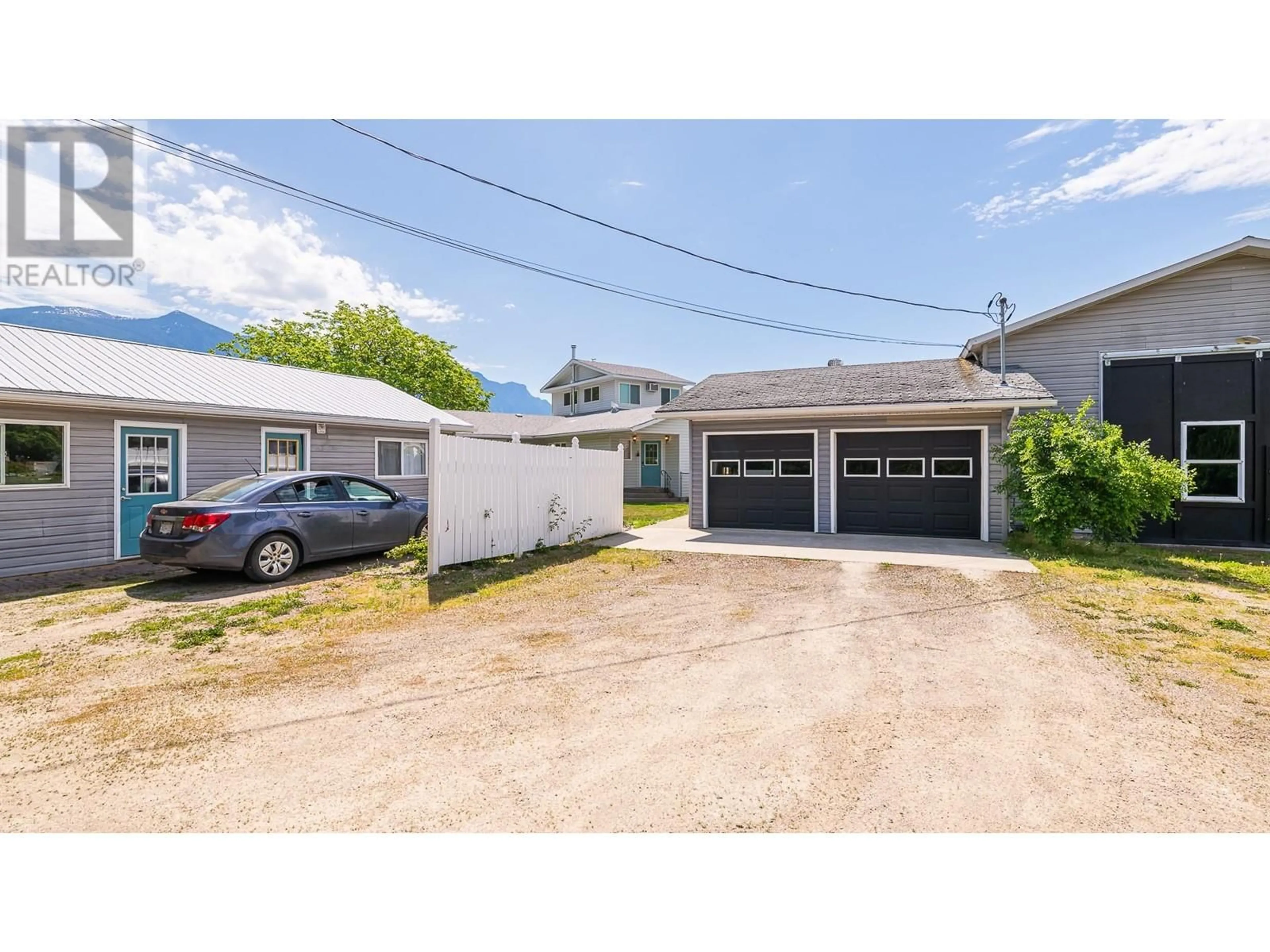 A pic from outside/outdoor area/front of a property/back of a property/a pic from drone, street for 409 33 AVENUE, Creston British Columbia V0B1G1
