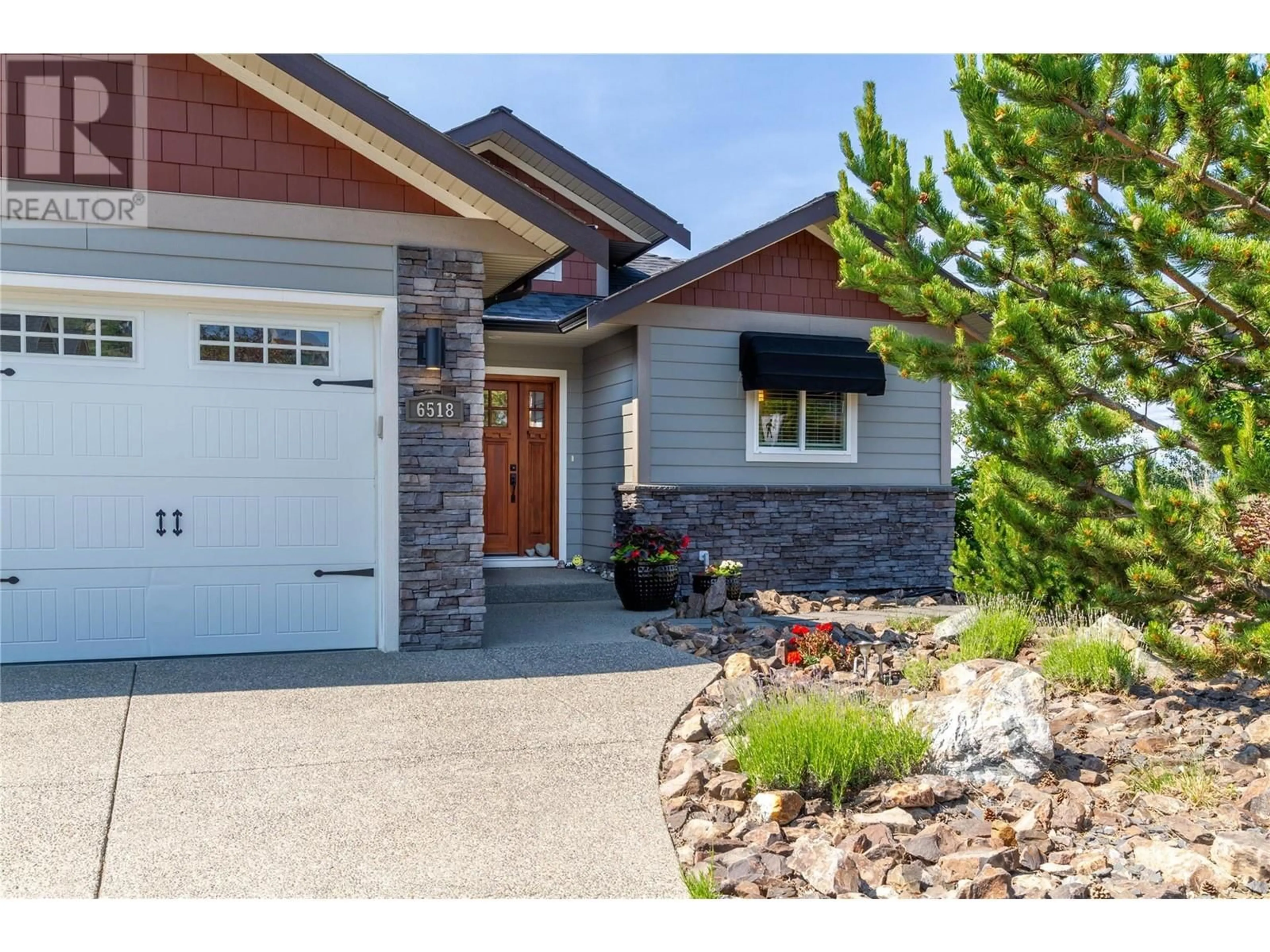 Home with brick exterior material, street for 6518 BLACKCOMB WAY, Vernon British Columbia V1B4E1