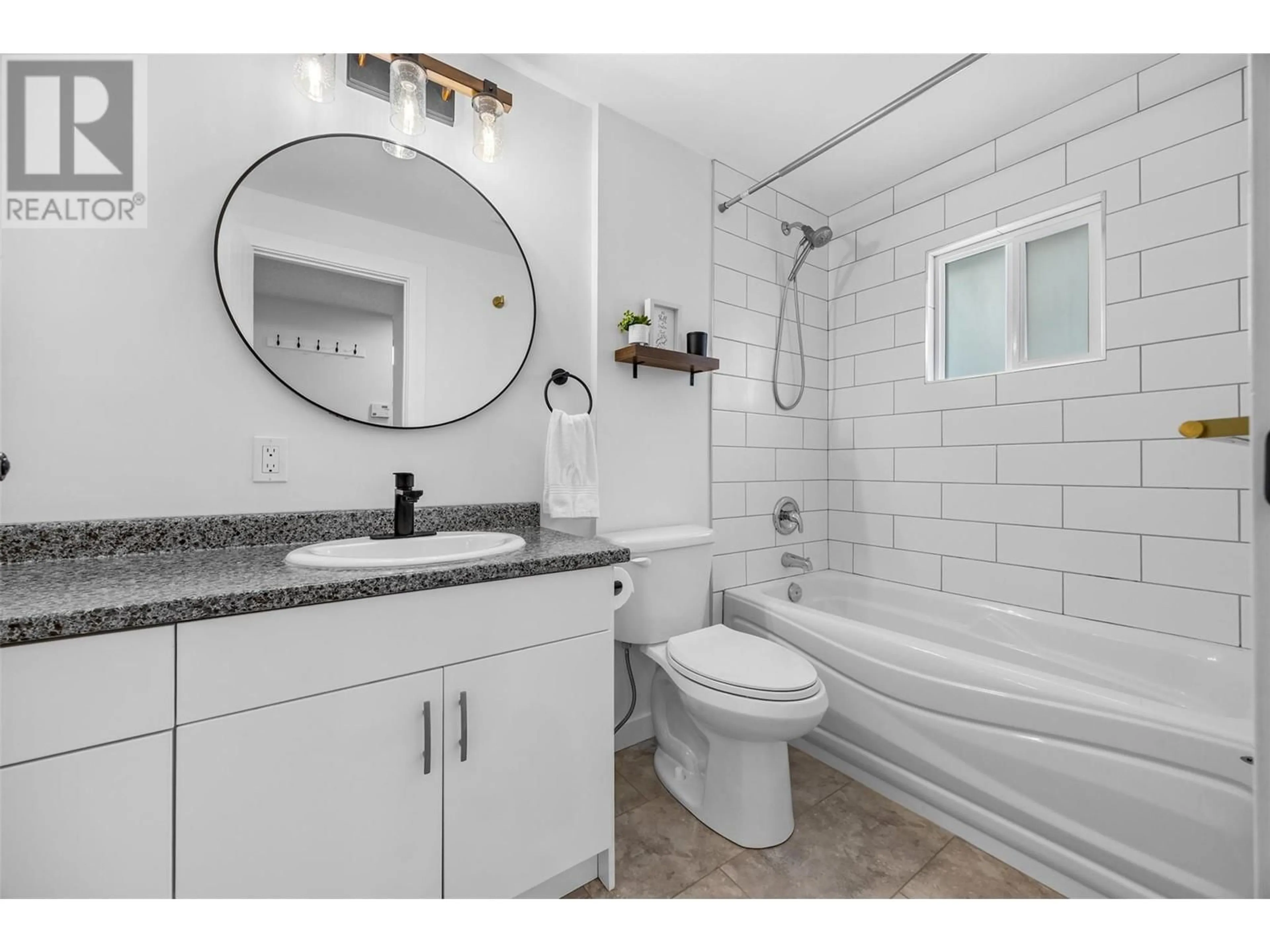 Standard bathroom, ceramic/tile floor for 1700 ATKINSON STREET, Penticton British Columbia V2A7M6