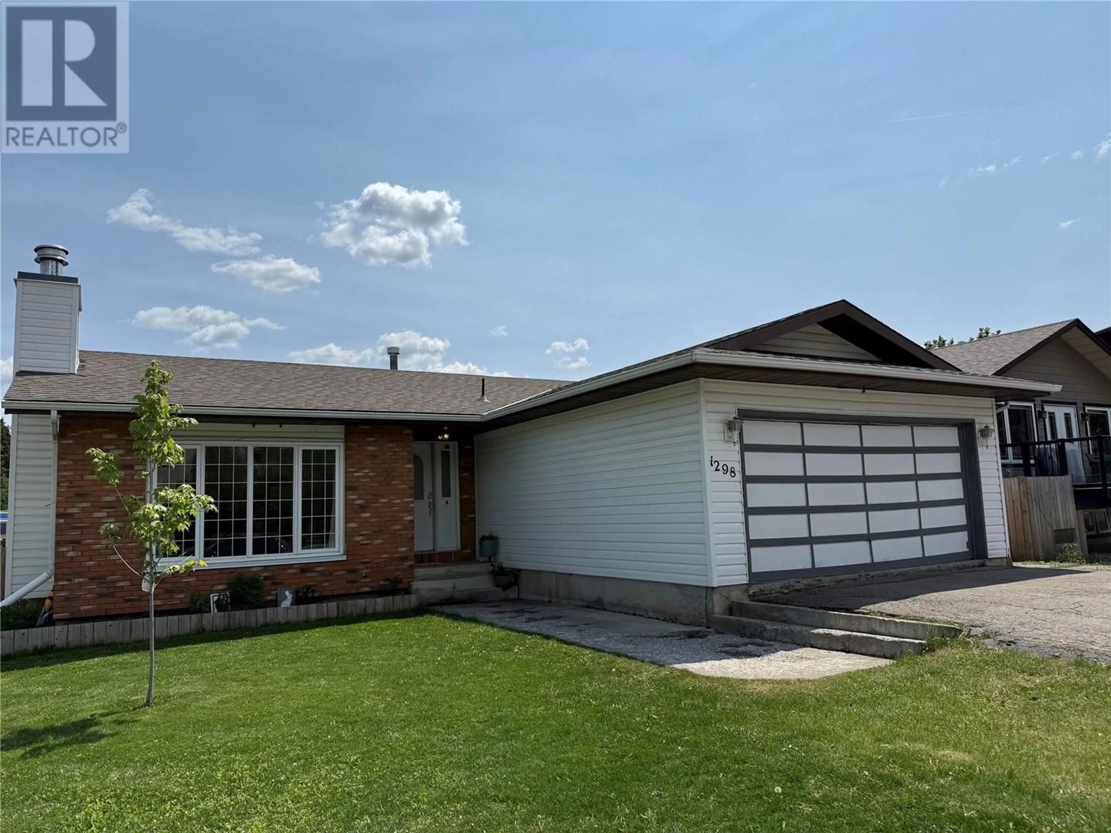 Home with vinyl exterior material, street for 1298 PINYON COURT, Sparwood British Columbia V0B2G2