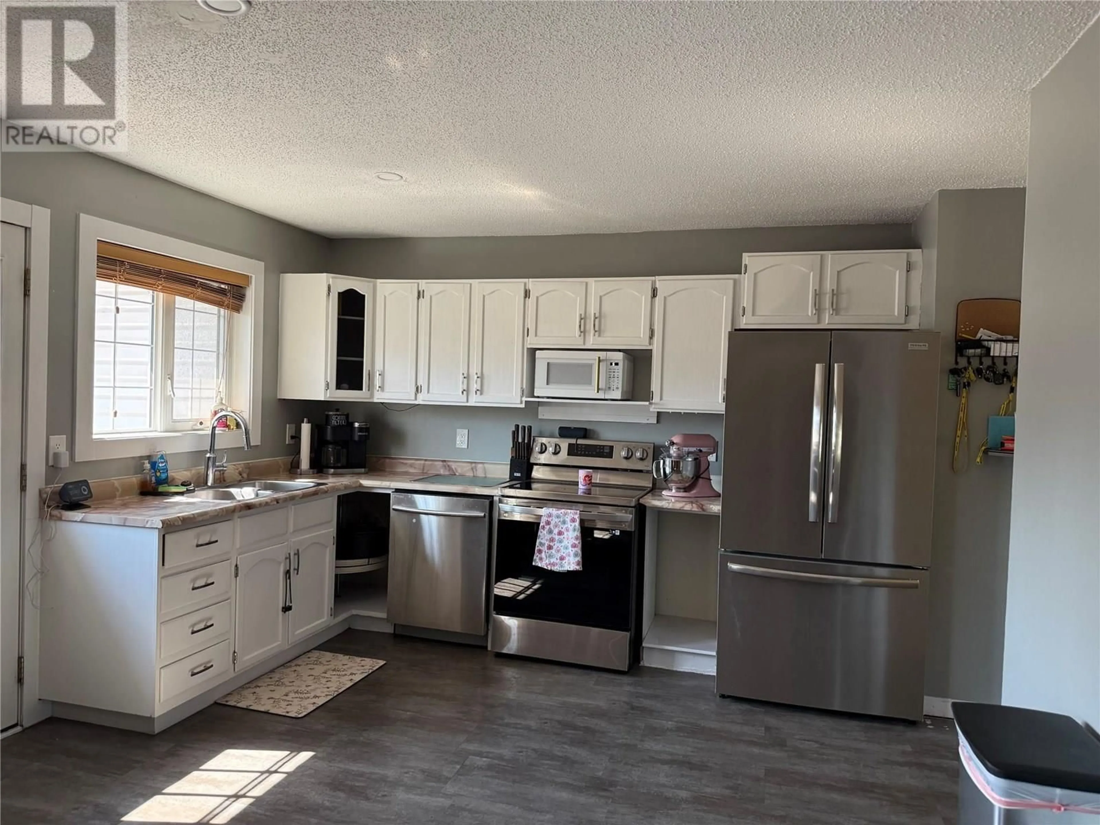 Open concept kitchen, unknown for 1298 PINYON COURT, Sparwood British Columbia V0B2G2