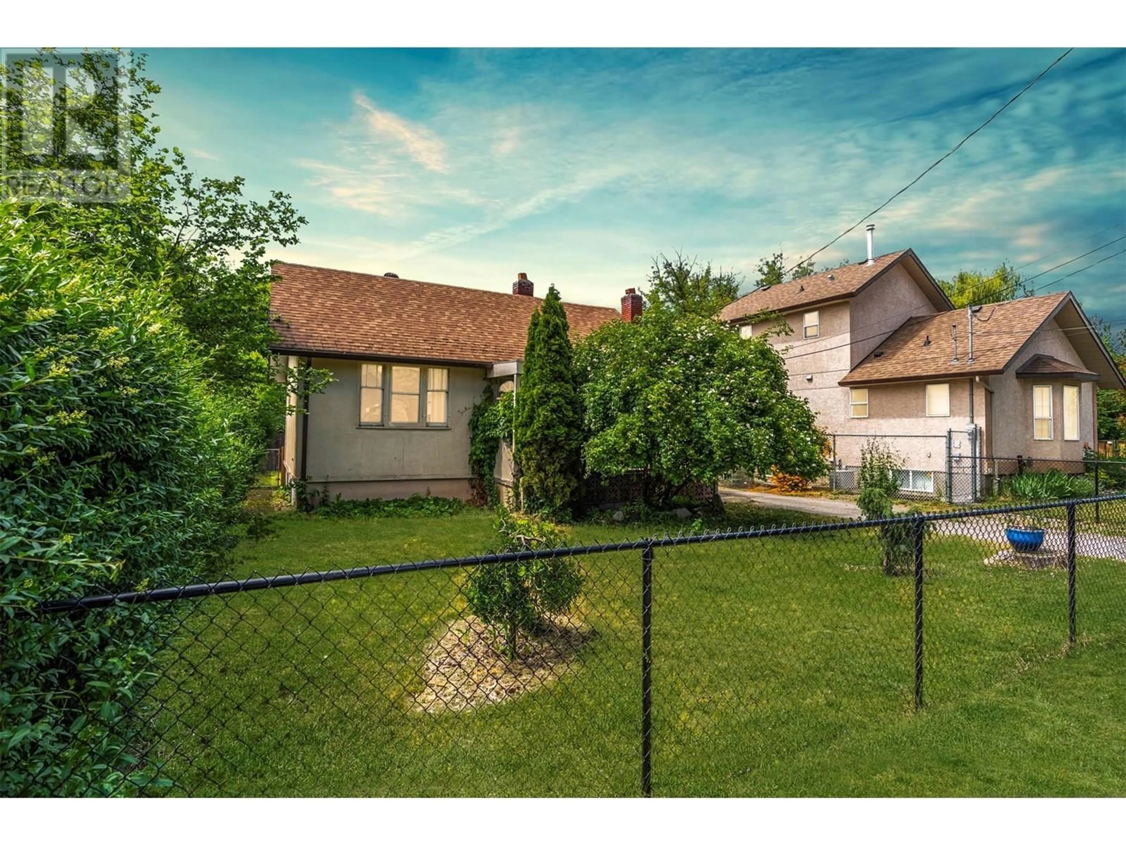 A pic from outside/outdoor area/front of a property/back of a property/a pic from drone, street for 3302 34 STREET, Vernon British Columbia V1T5X9