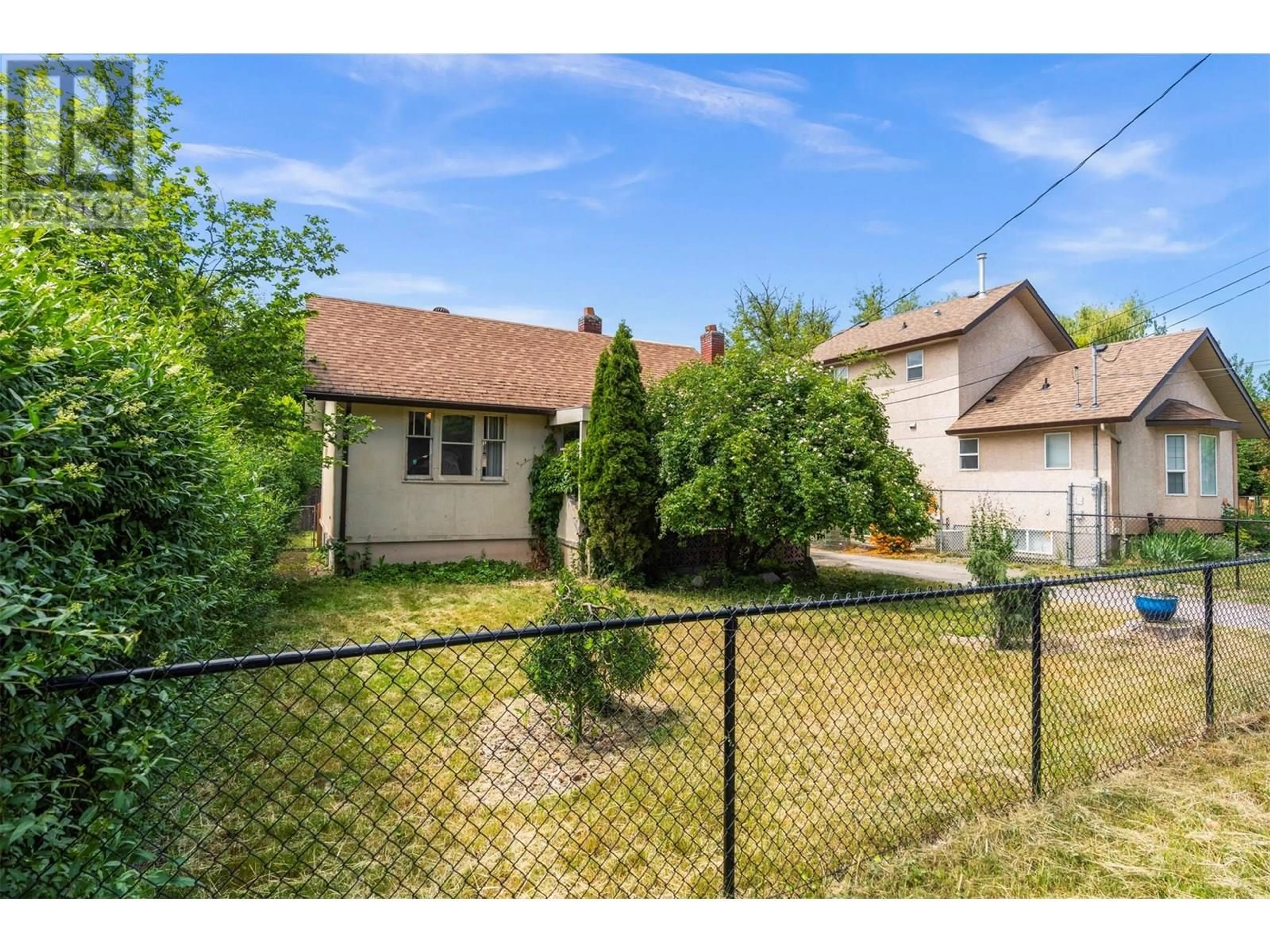 A pic from outside/outdoor area/front of a property/back of a property/a pic from drone, street for 3302 34 STREET, Vernon British Columbia V1T5X9