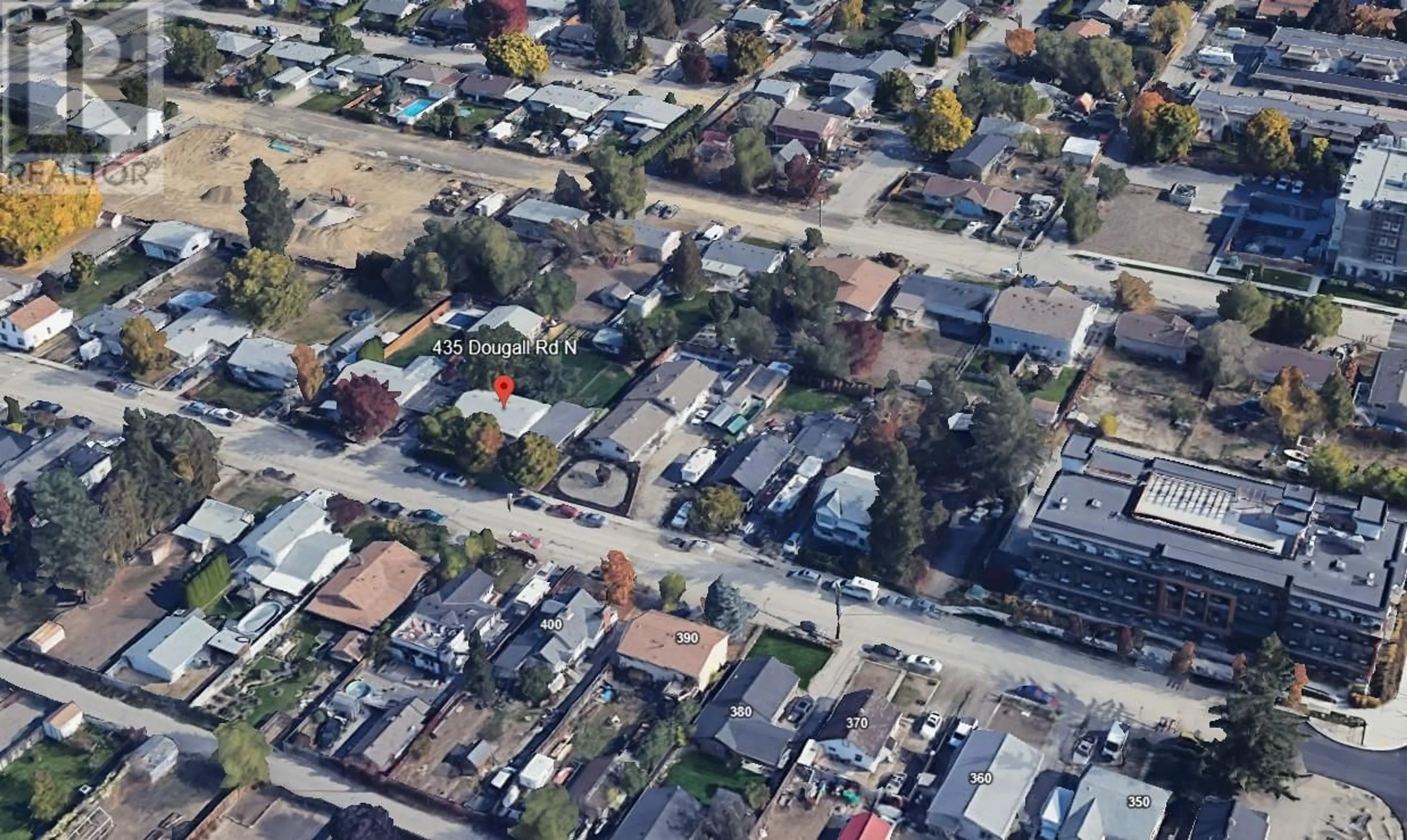 A pic from outside/outdoor area/front of a property/back of a property/a pic from drone, street for 435 DOUGALL ROAD NORTH, Kelowna British Columbia V1X3K5