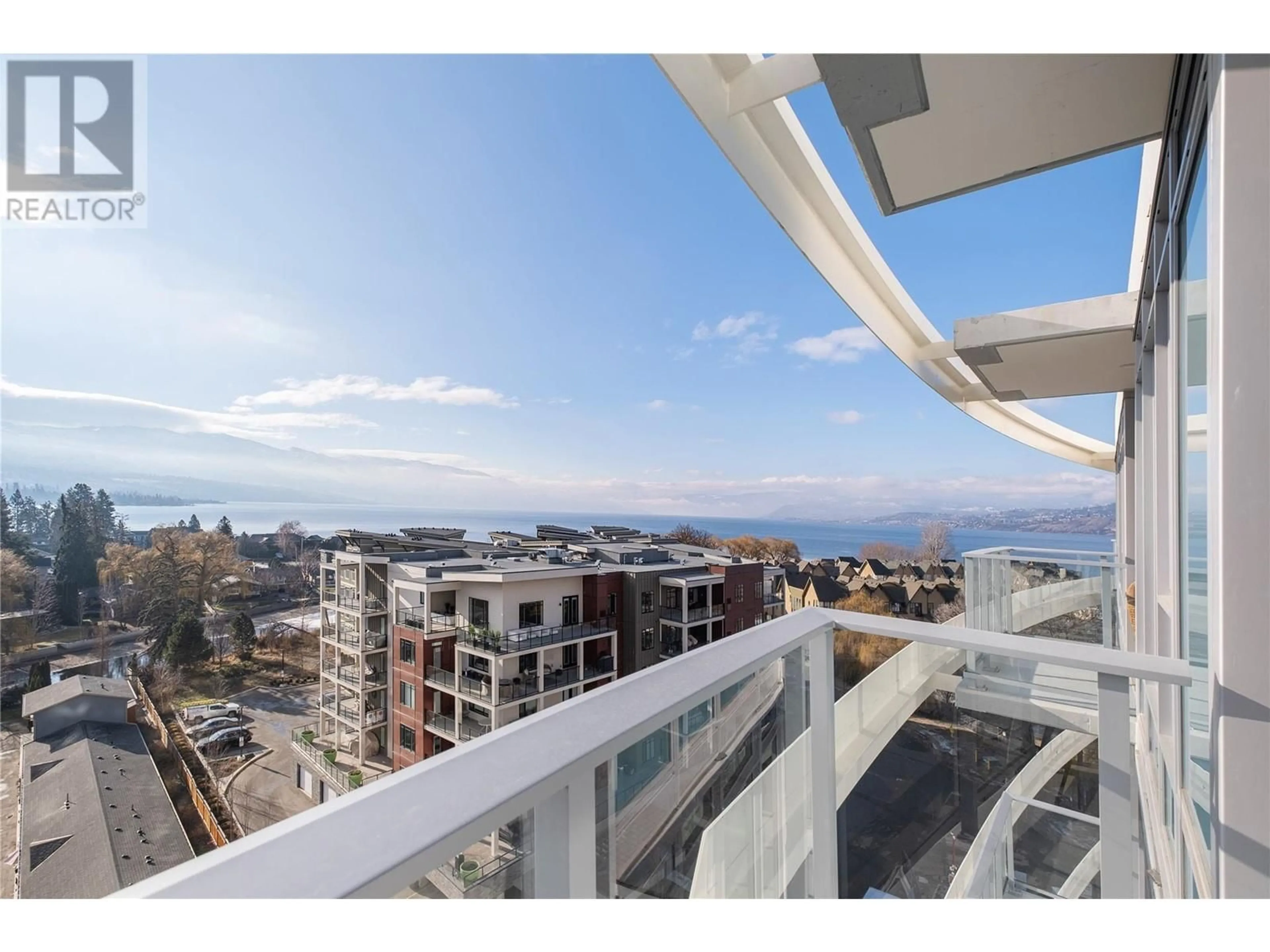 Balcony in the apartment, city buildings view from balcony for 907 - 3699 CAPOZZI ROAD, Kelowna British Columbia V1W0G3