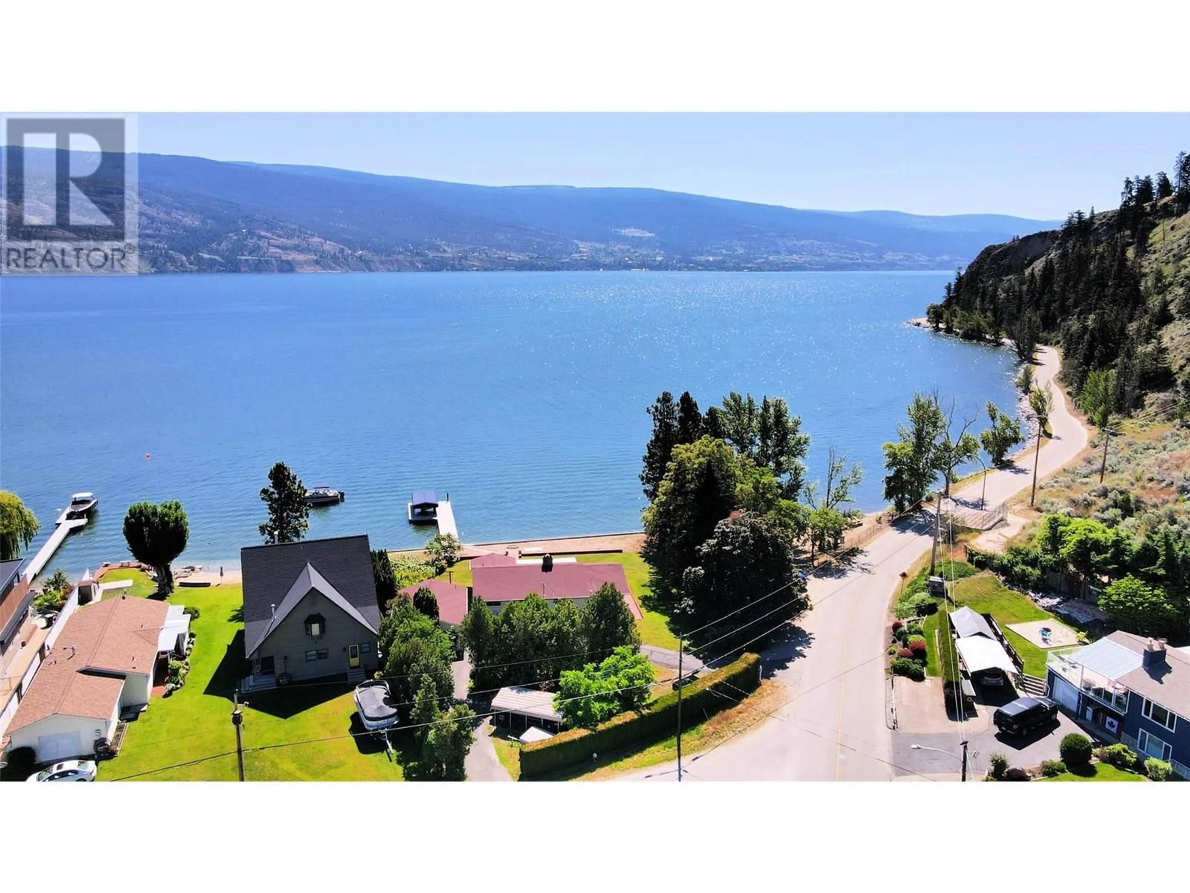 A pic from outside/outdoor area/front of a property/back of a property/a pic from drone, water/lake/river/ocean view for 7509 HIGGIN AVENUE, Summerland British Columbia V0H1Z6