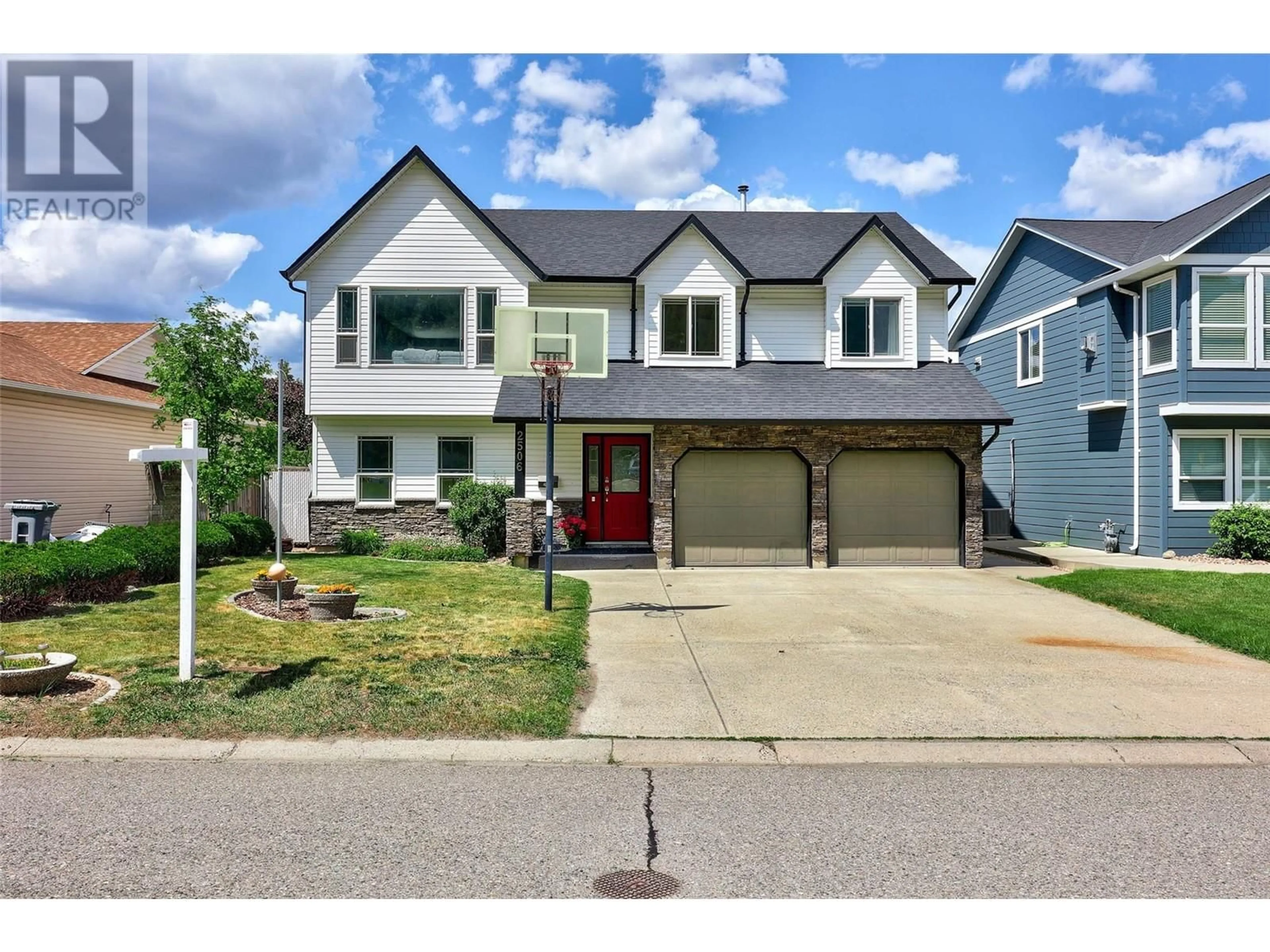 Home with vinyl exterior material, street for 2506 NECHAKO DRIVE, Kamloops British Columbia V2E2C9