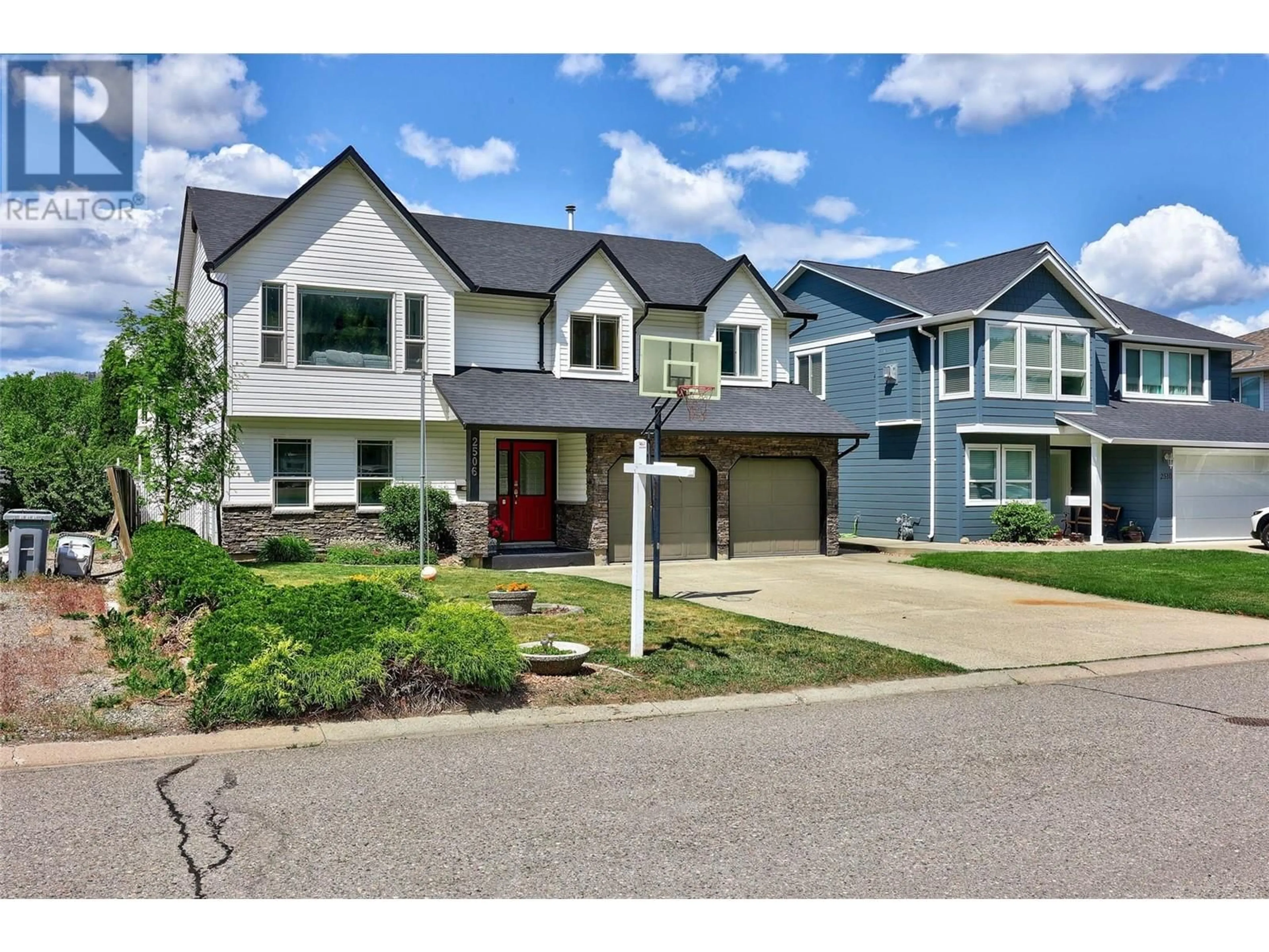 Home with vinyl exterior material, street for 2506 NECHAKO DRIVE, Kamloops British Columbia V2E2C9