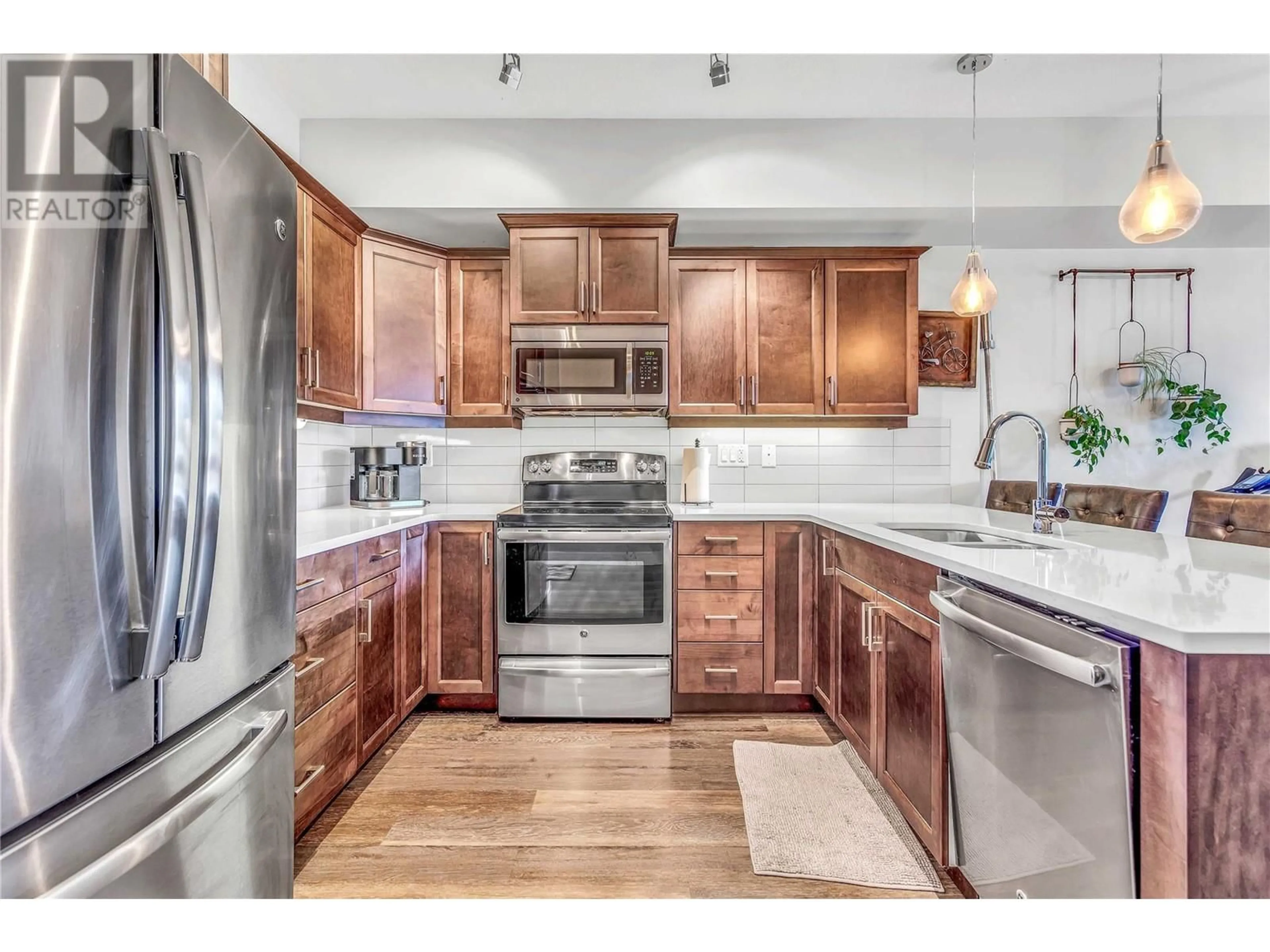 Open concept kitchen, unknown for 206 - 3731 CASORSO ROAD, Kelowna British Columbia V1W5E9