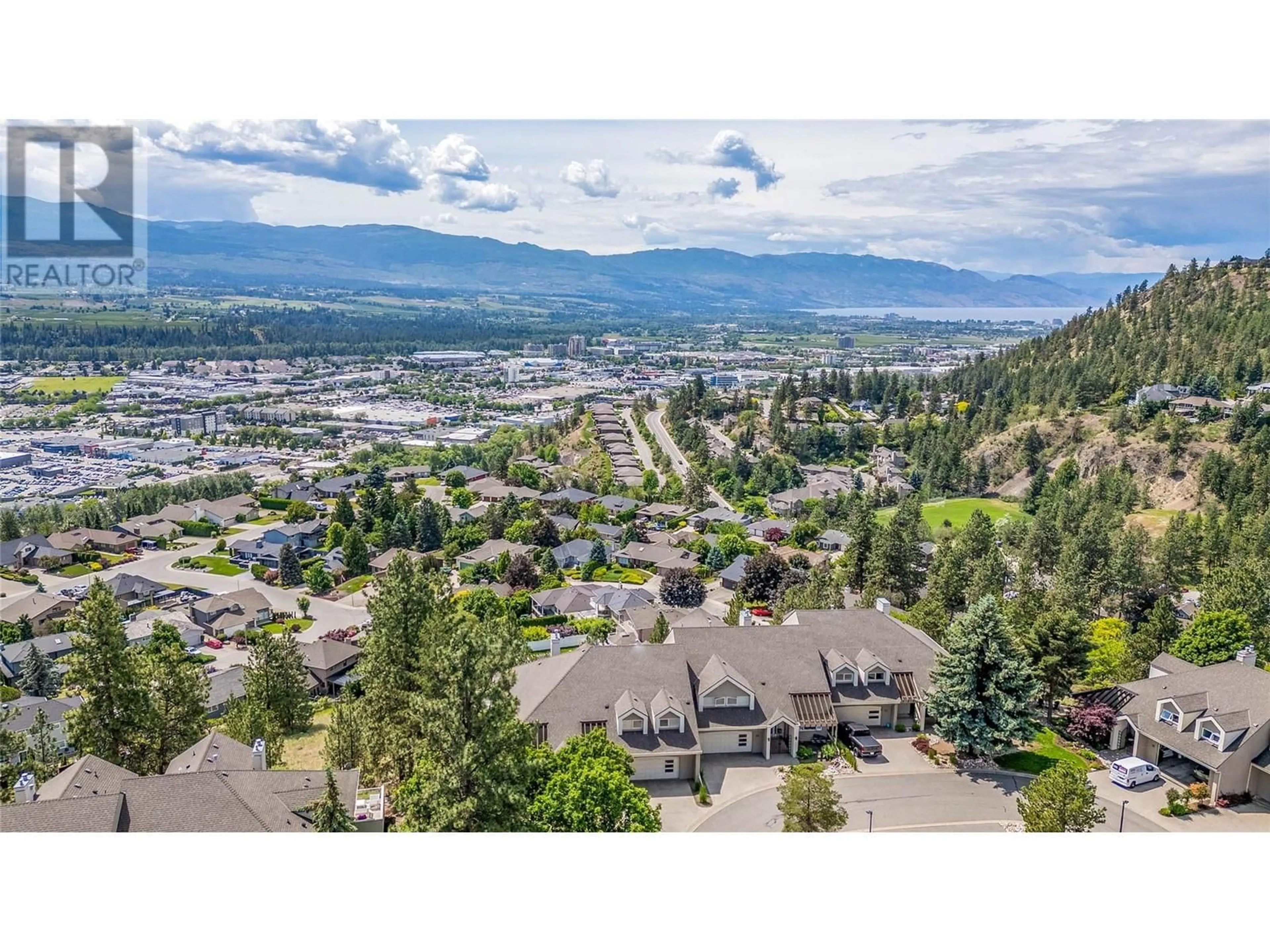 A pic from outside/outdoor area/front of a property/back of a property/a pic from drone, mountain view for 21 - 880 CHRISTINA PLACE, Kelowna British Columbia V1V1S4
