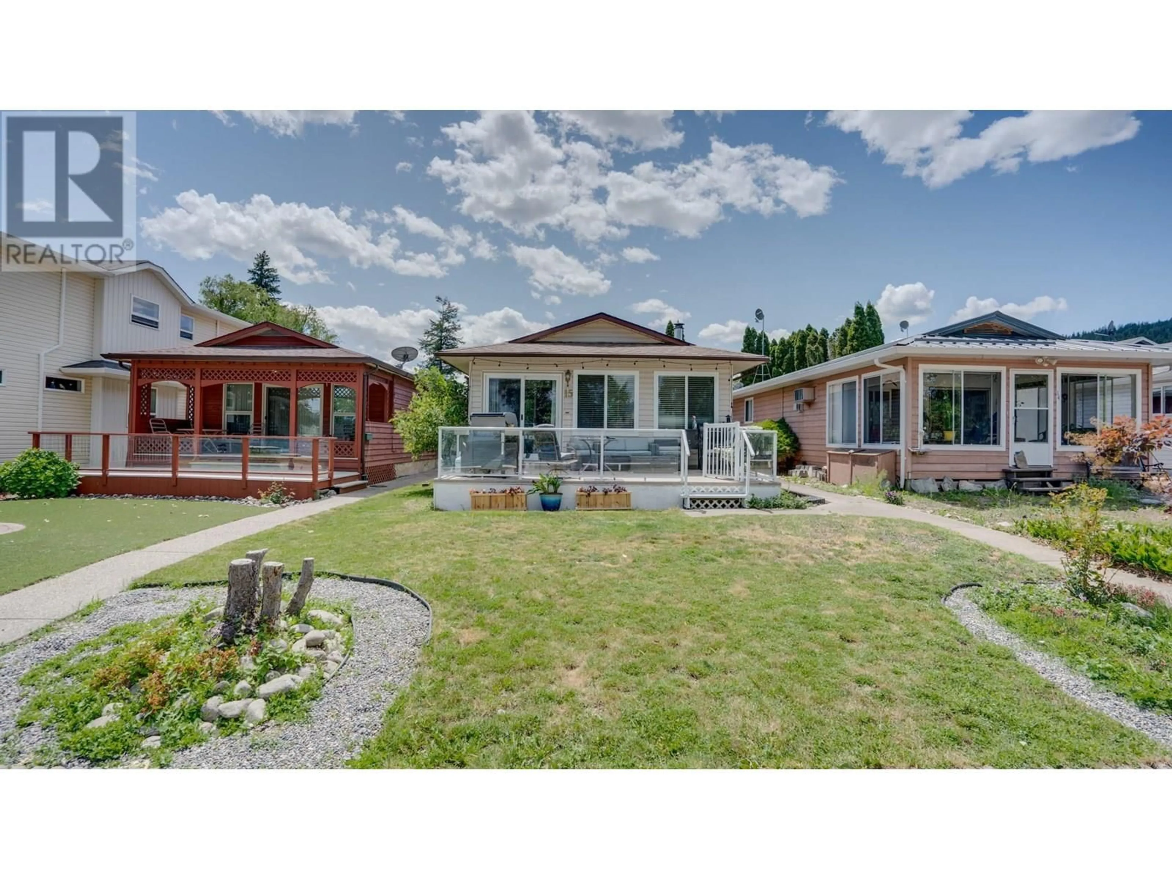 A pic from outside/outdoor area/front of a property/back of a property/a pic from drone, street for 15 LAKESHORE DRIVE, Vernon British Columbia V1H2A1