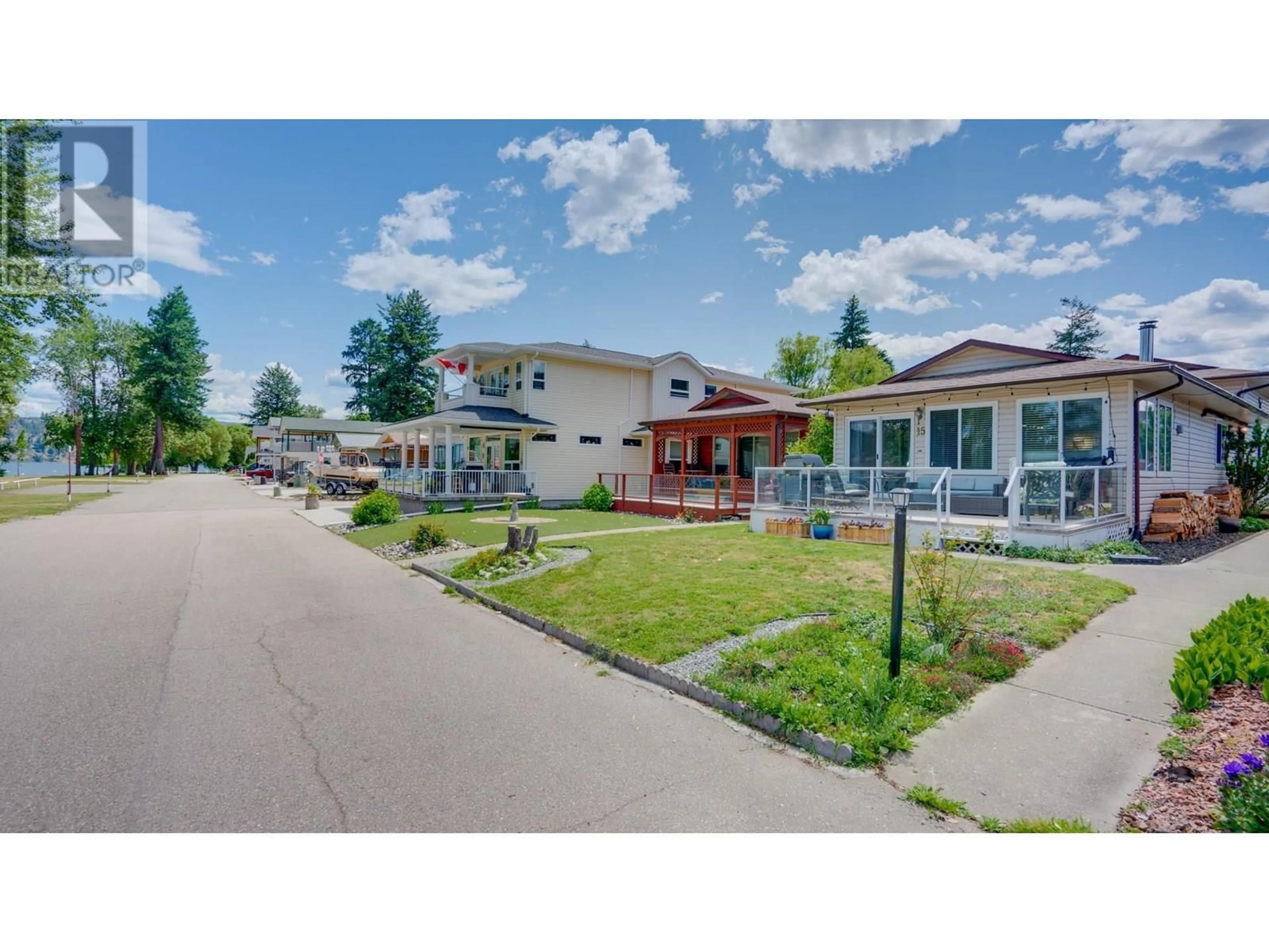 A pic from outside/outdoor area/front of a property/back of a property/a pic from drone, street for 15 LAKESHORE DRIVE, Vernon British Columbia V1H2A1