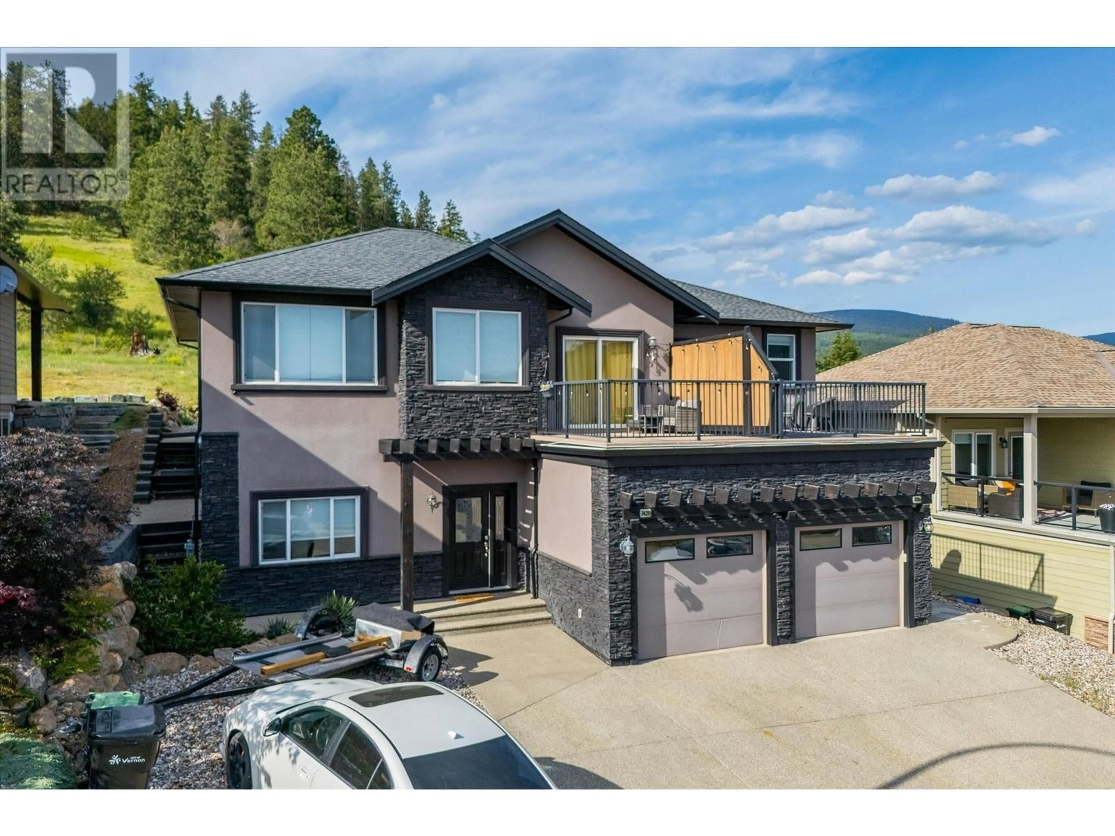Home with vinyl exterior material, mountain view for 7420 SUN PEAKS DRIVE, Vernon British Columbia V1B4C7