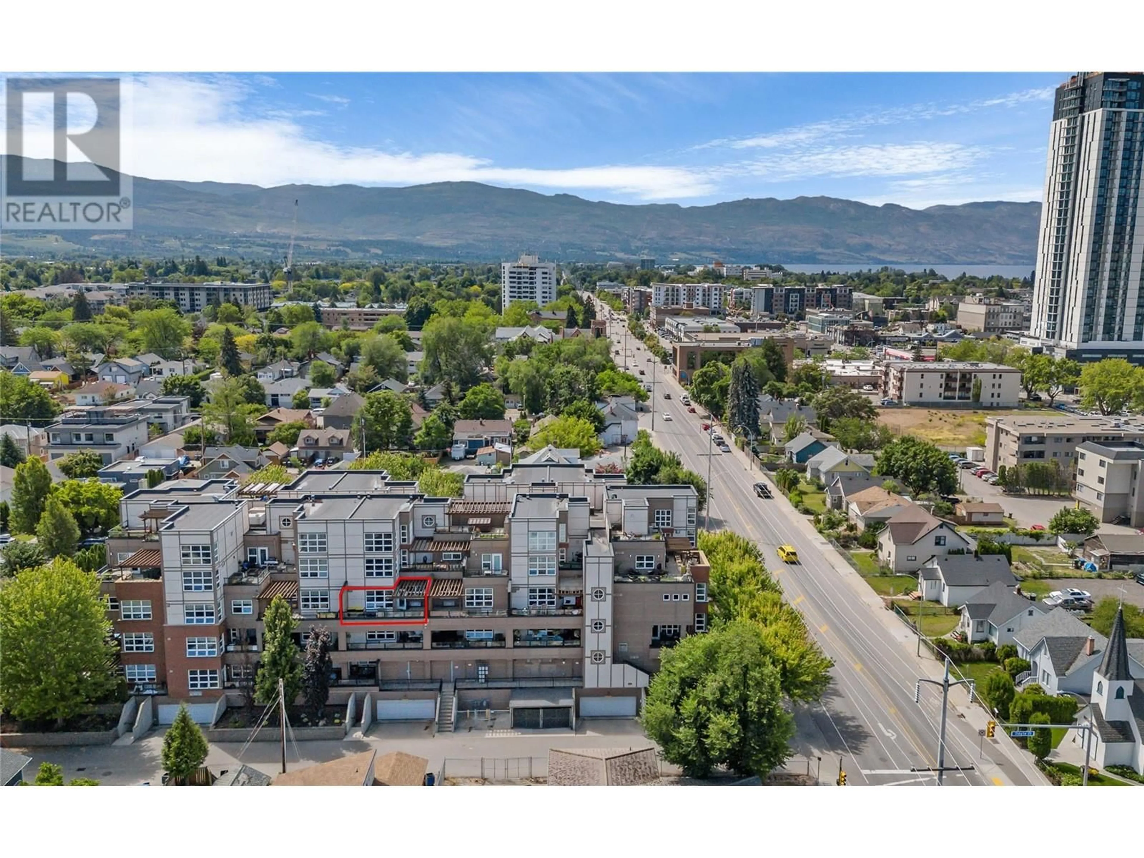 A pic from outside/outdoor area/front of a property/back of a property/a pic from drone, mountain view for 307 - 700 MARTIN AVENUE, Kelowna British Columbia V1Y6V3