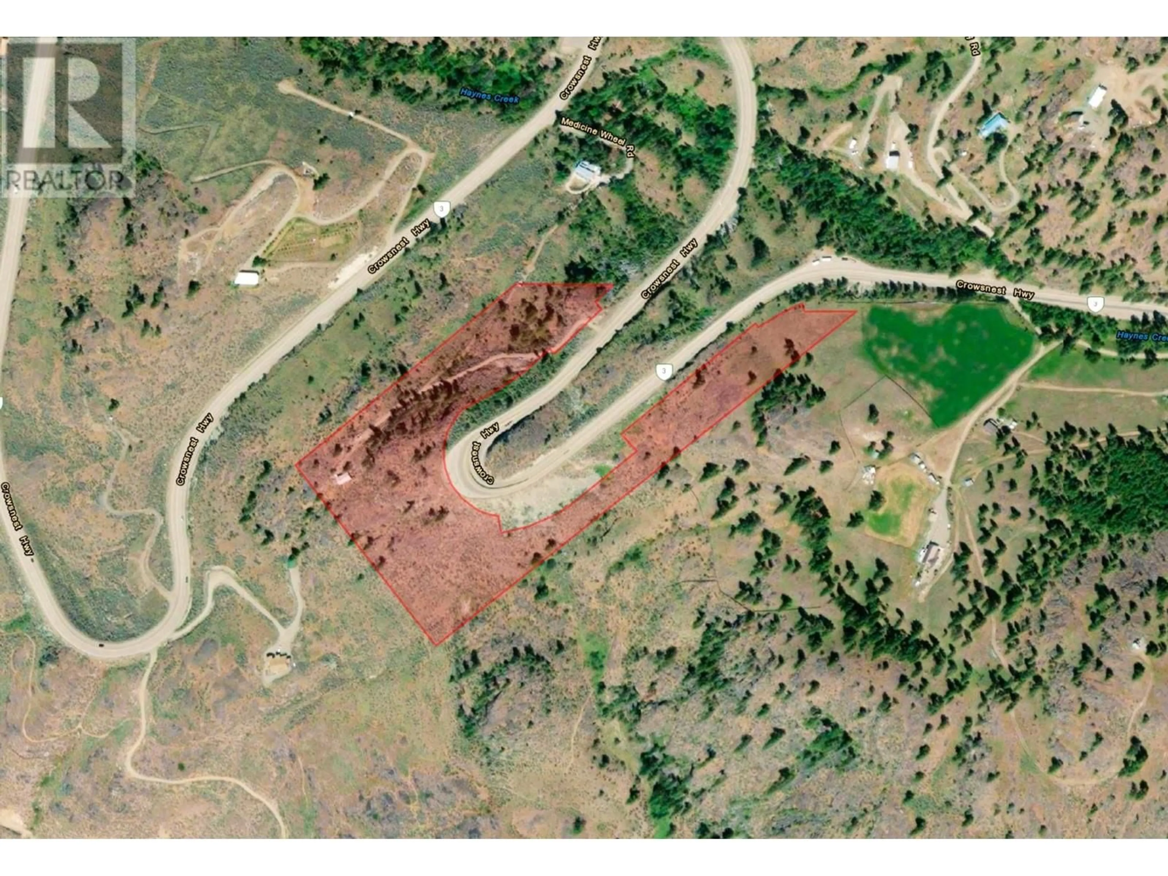 A pic from outside/outdoor area/front of a property/back of a property/a pic from drone, street for 1345 3 HIGHWAY, Osoyoos British Columbia V0H1V6