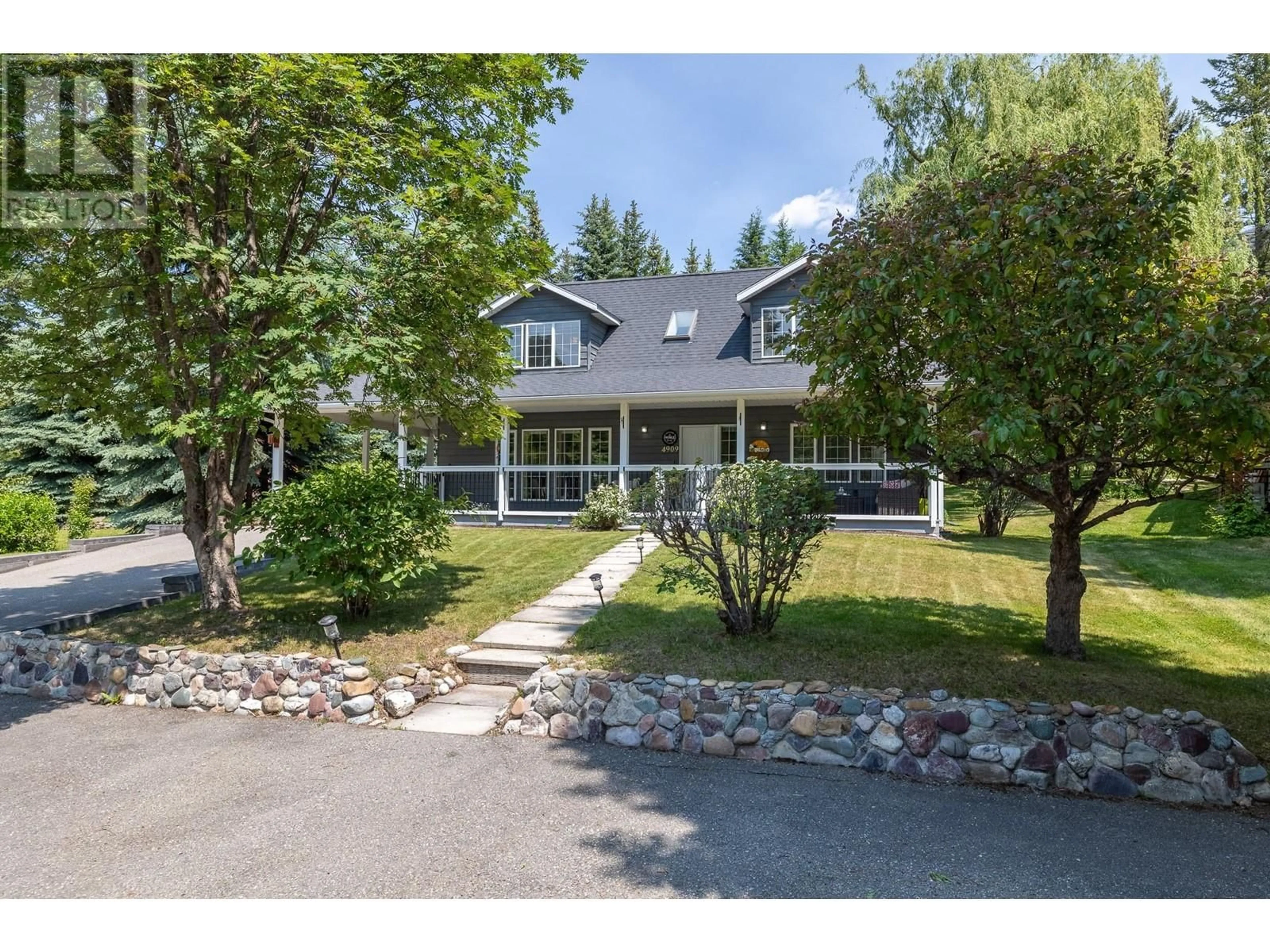A pic from outside/outdoor area/front of a property/back of a property/a pic from drone, unknown for 4909 MEADOWS CRESCENT, Fairmont Hot Springs British Columbia V0B1L0